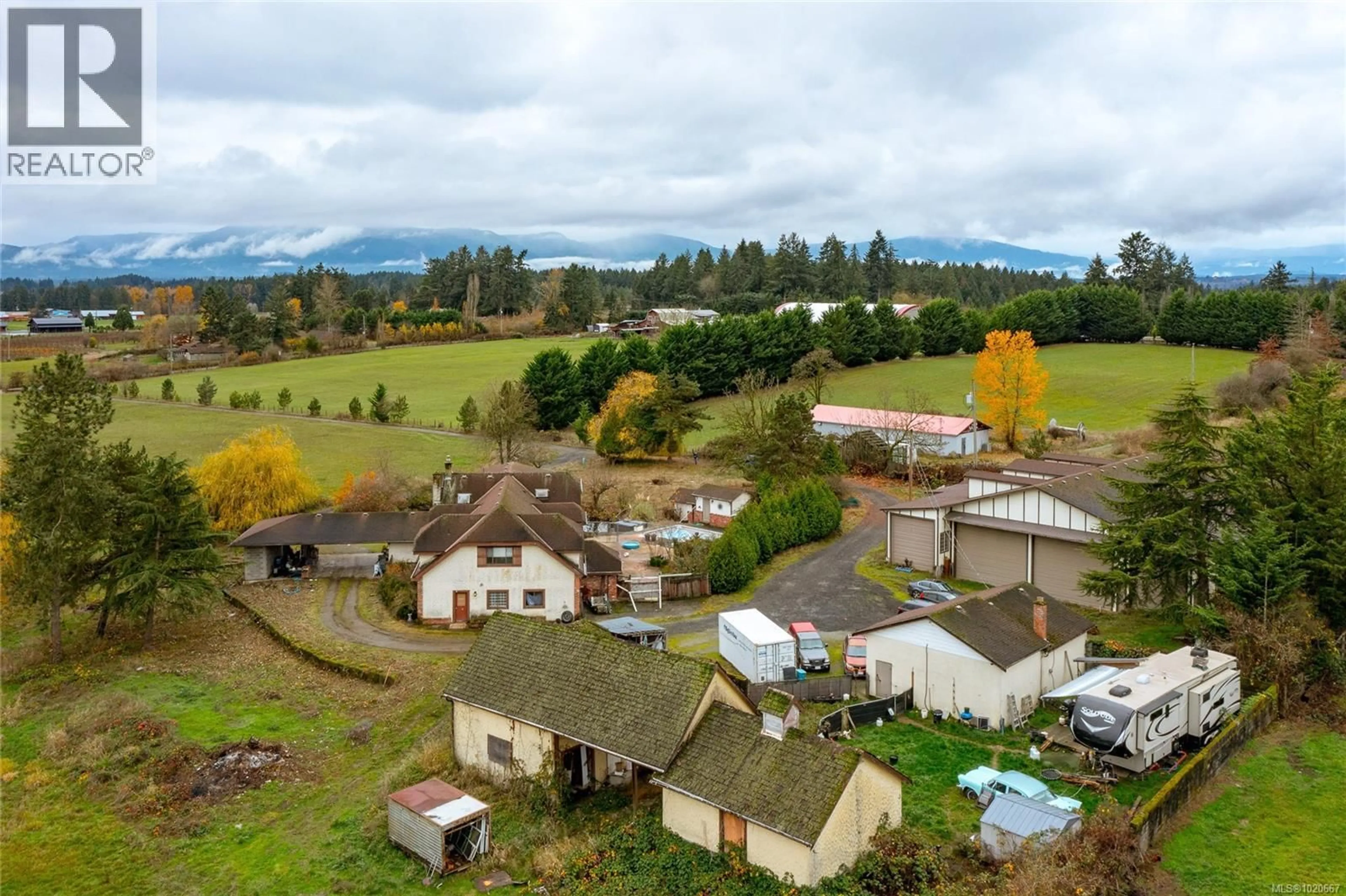 A pic from outside/outdoor area/front of a property/back of a property/a pic from drone, mountain view for 1909 STAMPS ROAD, Duncan British Columbia V9L5W1