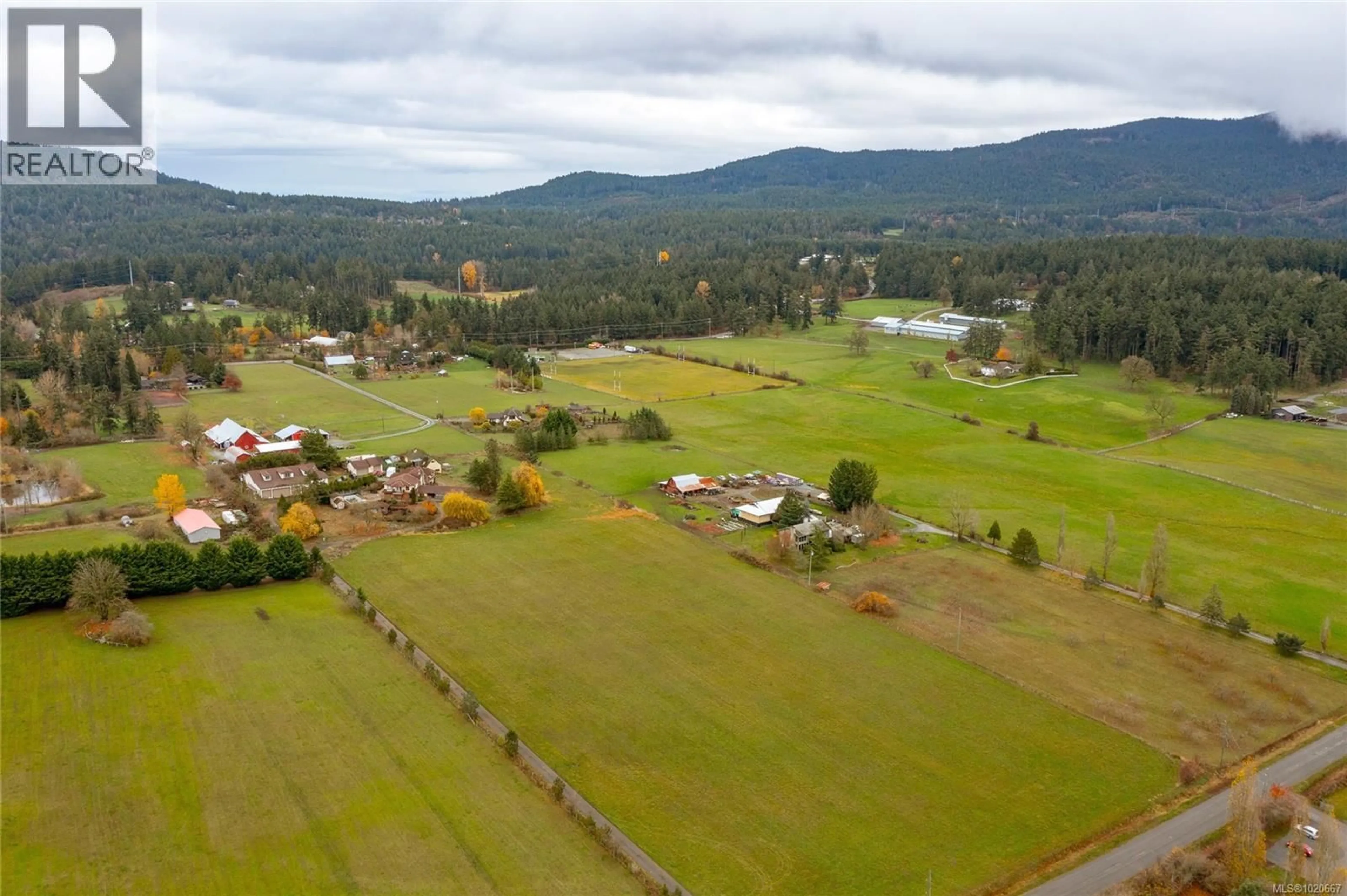 A pic from outside/outdoor area/front of a property/back of a property/a pic from drone, mountain view for 1909 STAMPS ROAD, Duncan British Columbia V9L5W1