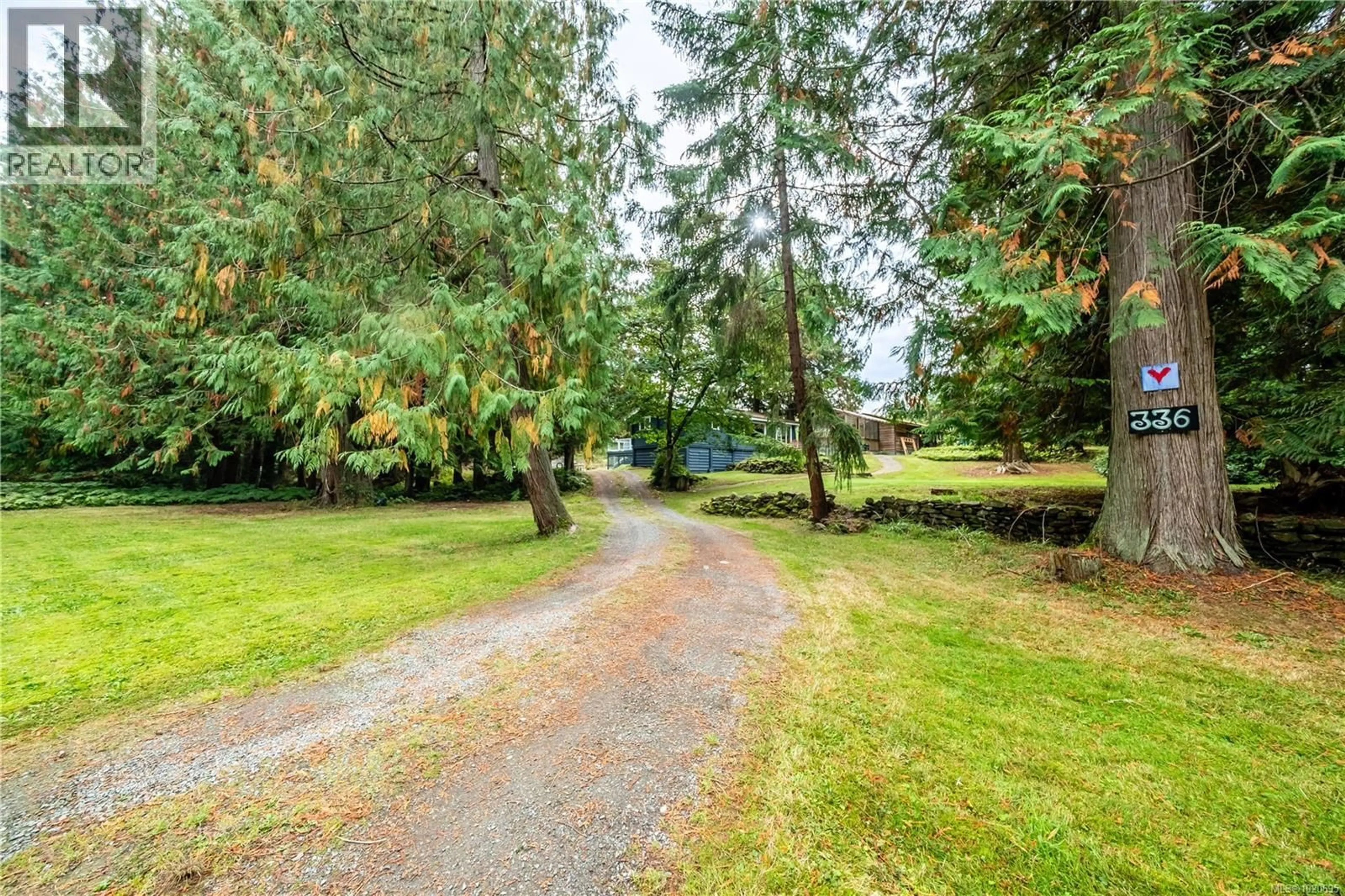 A pic from outside/outdoor area/front of a property/back of a property/a pic from drone, forest/trees view for 336 HEMLOCK AVENUE, Gabriola Island British Columbia V0R1X1
