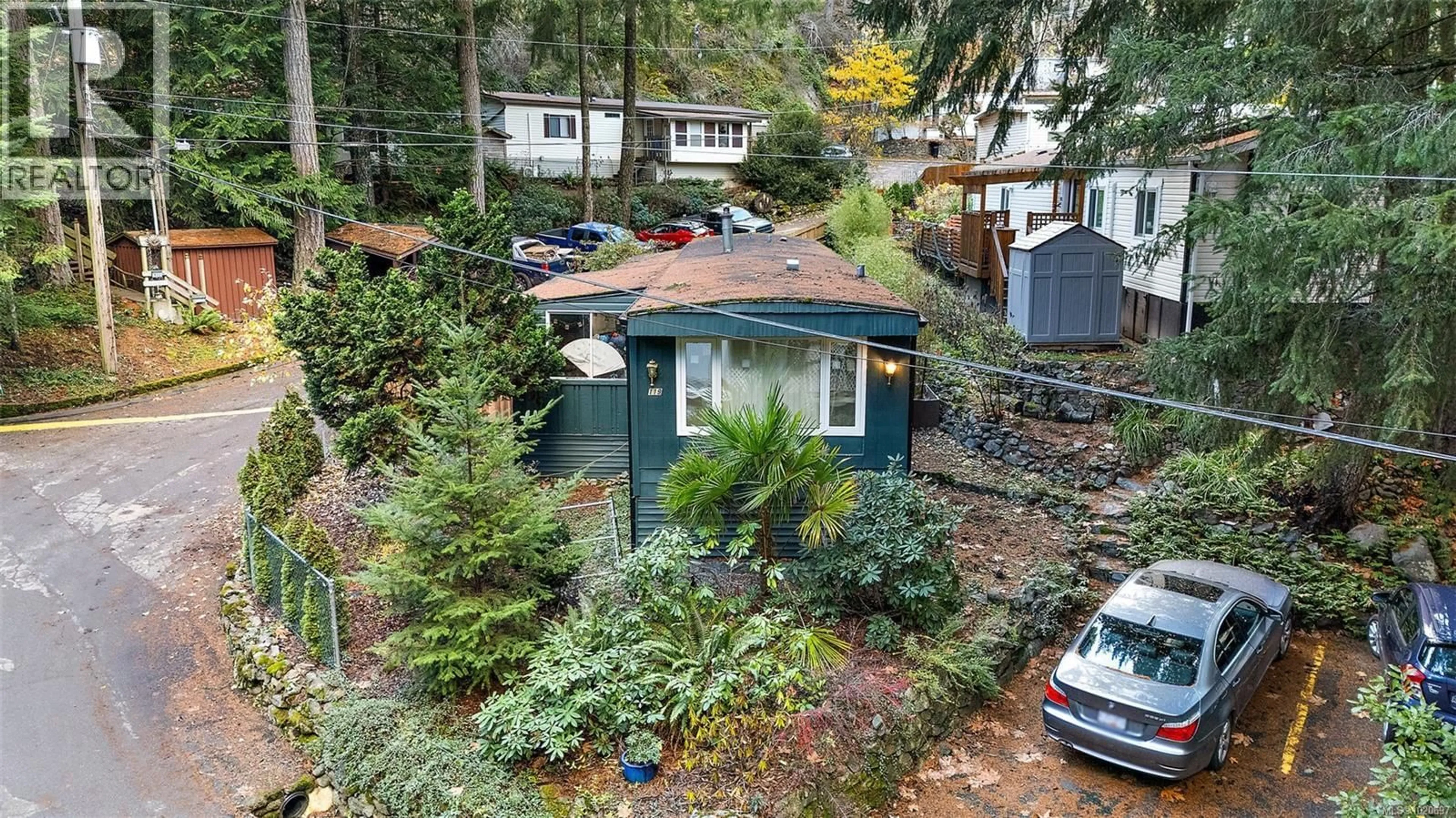 A pic from outside/outdoor area/front of a property/back of a property/a pic from drone, street for 119 - 2500 FLORENCE LAKE ROAD, Langford British Columbia V9B4H2