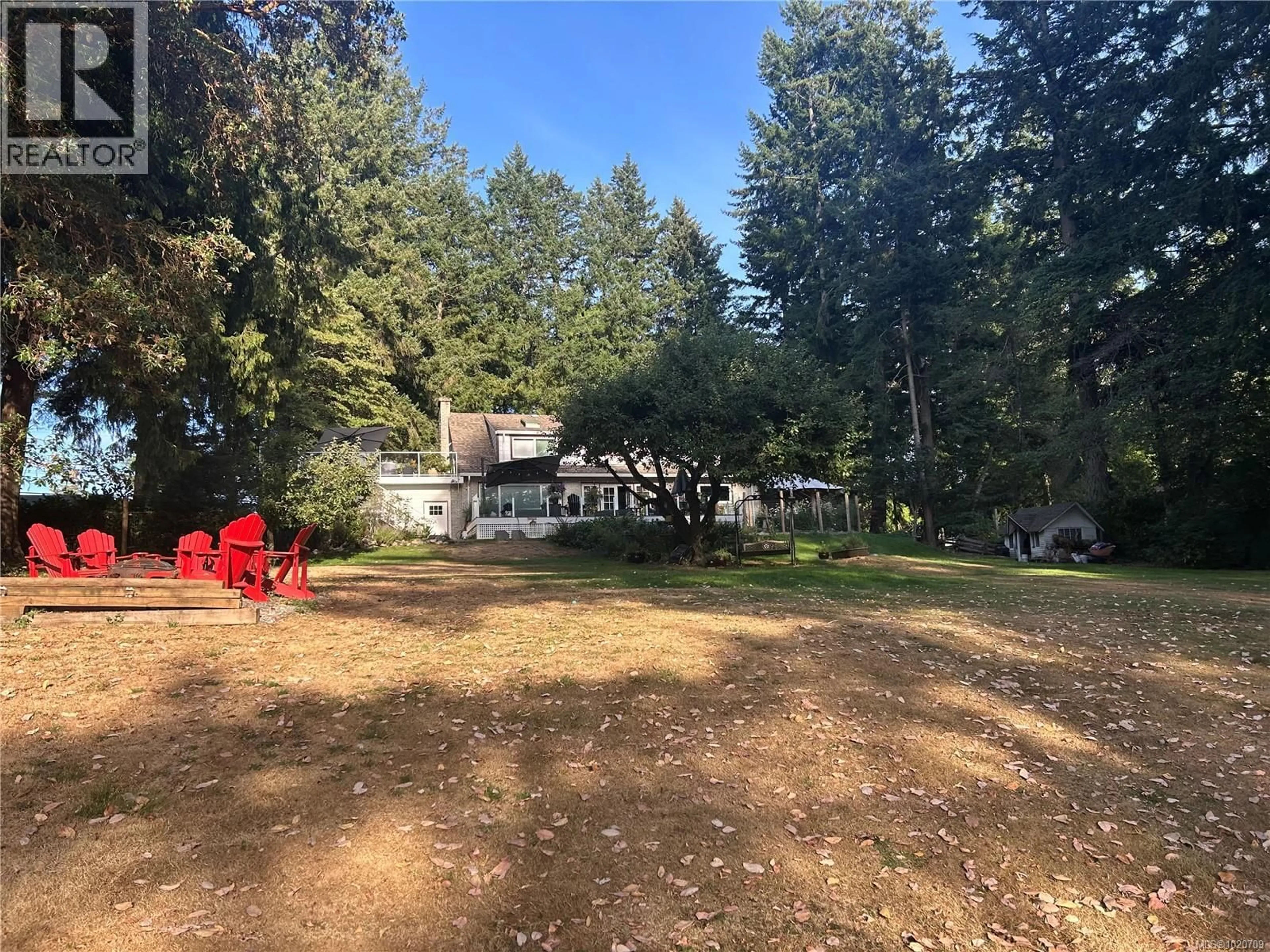 A pic from outside/outdoor area/front of a property/back of a property/a pic from drone, forest/trees view for 5182 SANTA CLARA AVENUE, Saanich British Columbia V8Y1W4