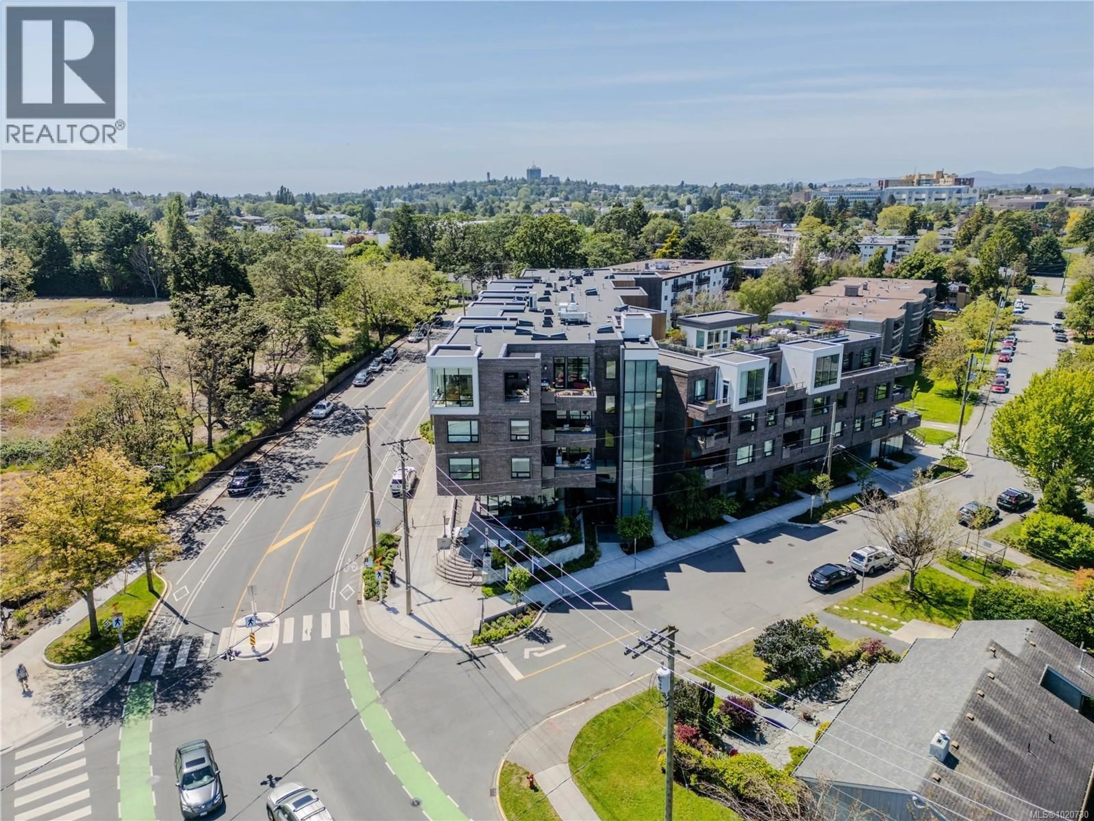 A pic from outside/outdoor area/front of a property/back of a property/a pic from drone, city buildings view from balcony for 407 - 2285 BOWKER AVENUE, Oak Bay British Columbia V8R2E2