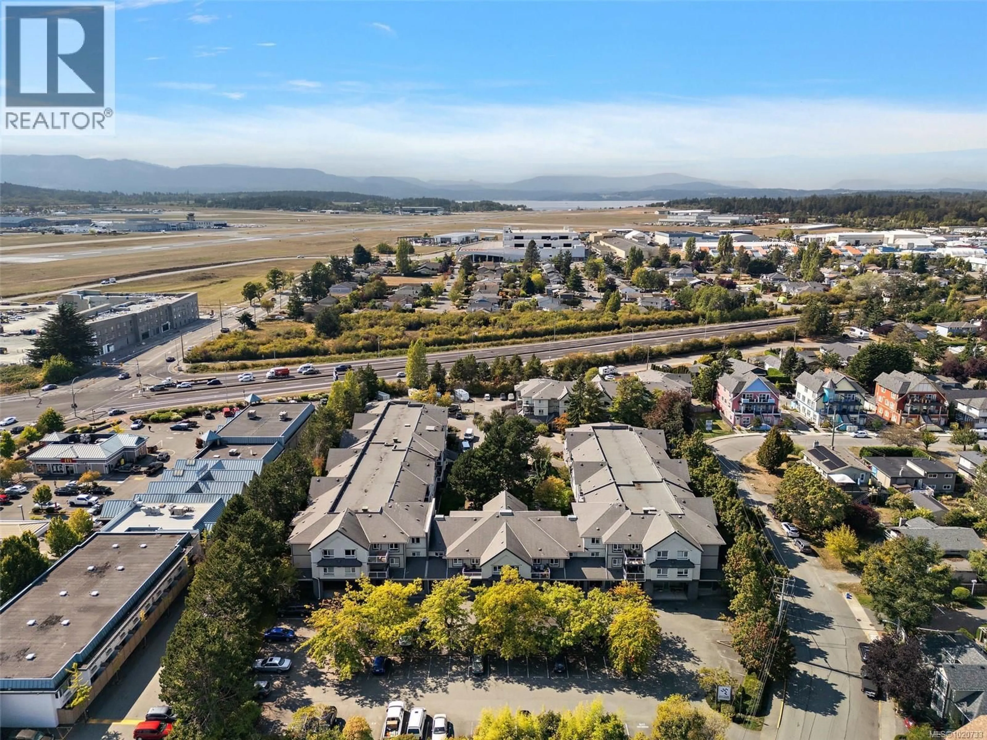 A pic from outside/outdoor area/front of a property/back of a property/a pic from drone, mountain view for 228 - 2245 JAMES WHITE BOULEVARD, Sidney British Columbia V8L1Z5