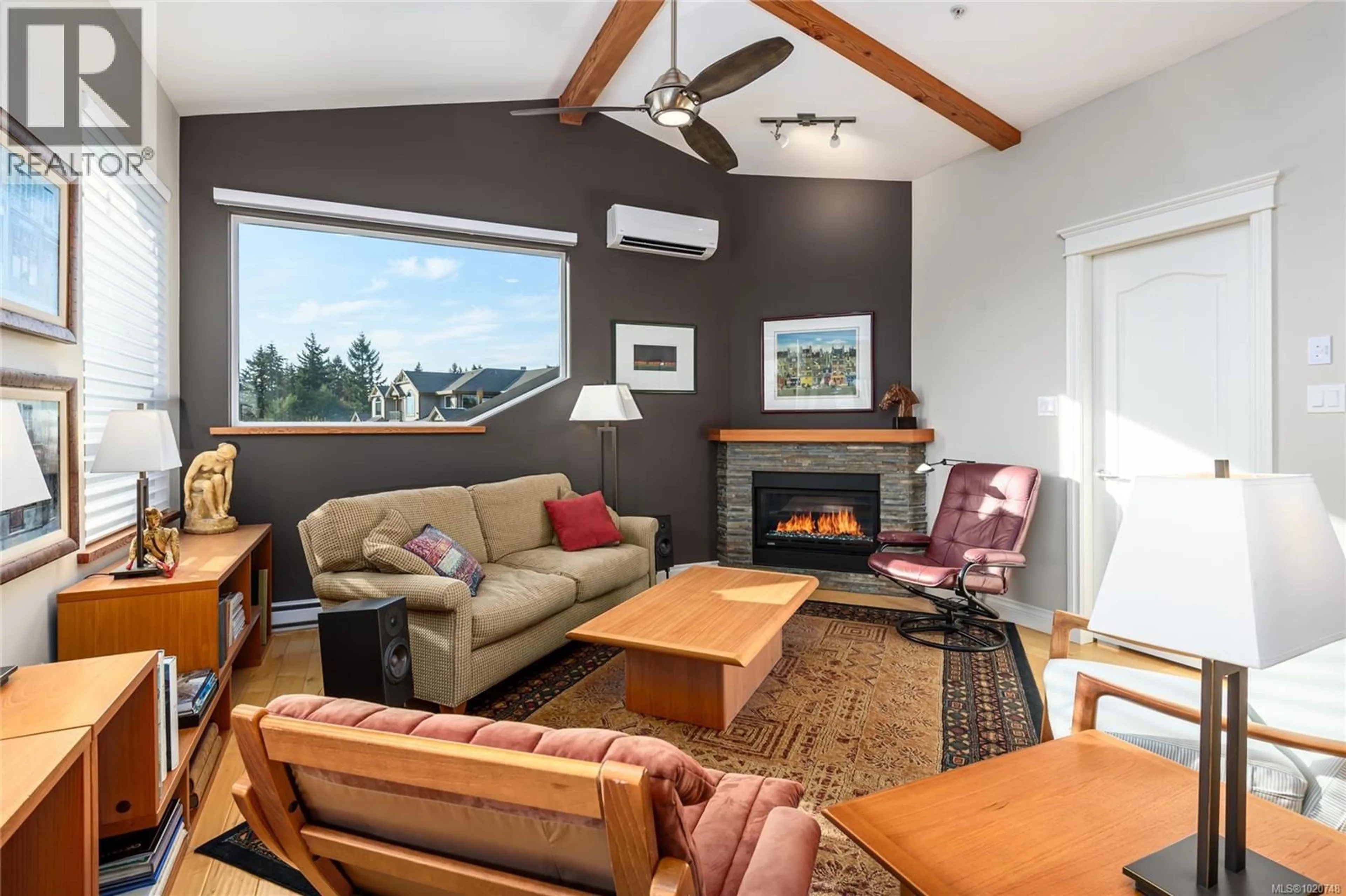 Living room with furniture, wood/laminate floor for 641 - 3666 ROYAL VISTA WAY, Courtenay British Columbia V9N9X8