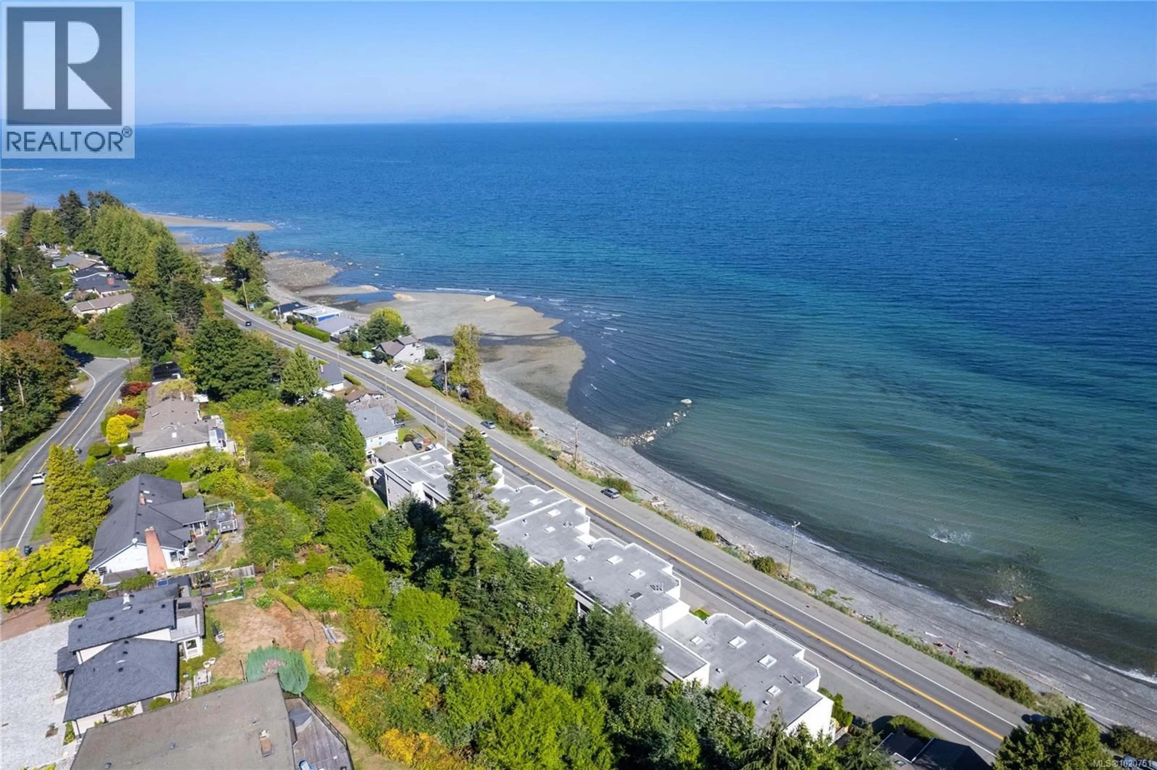 A pic from outside/outdoor area/front of a property/back of a property/a pic from drone, water/lake/river/ocean view for 103 - 3156 ISLAND HIGHWAY WEST, Qualicum Beach British Columbia V9K2C6