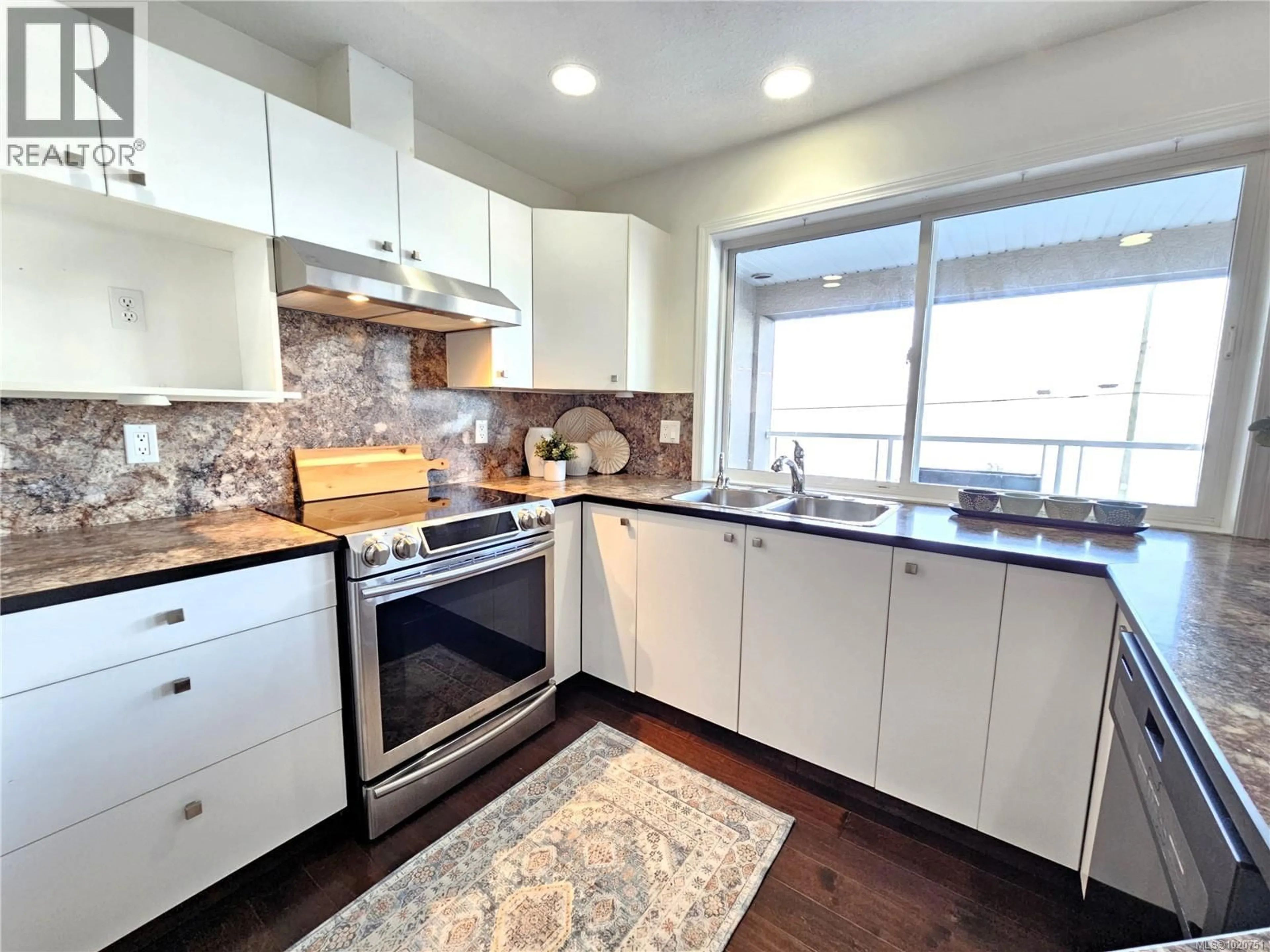 Open concept kitchen, unknown for 103 - 3156 ISLAND HIGHWAY WEST, Qualicum Beach British Columbia V9K2C6