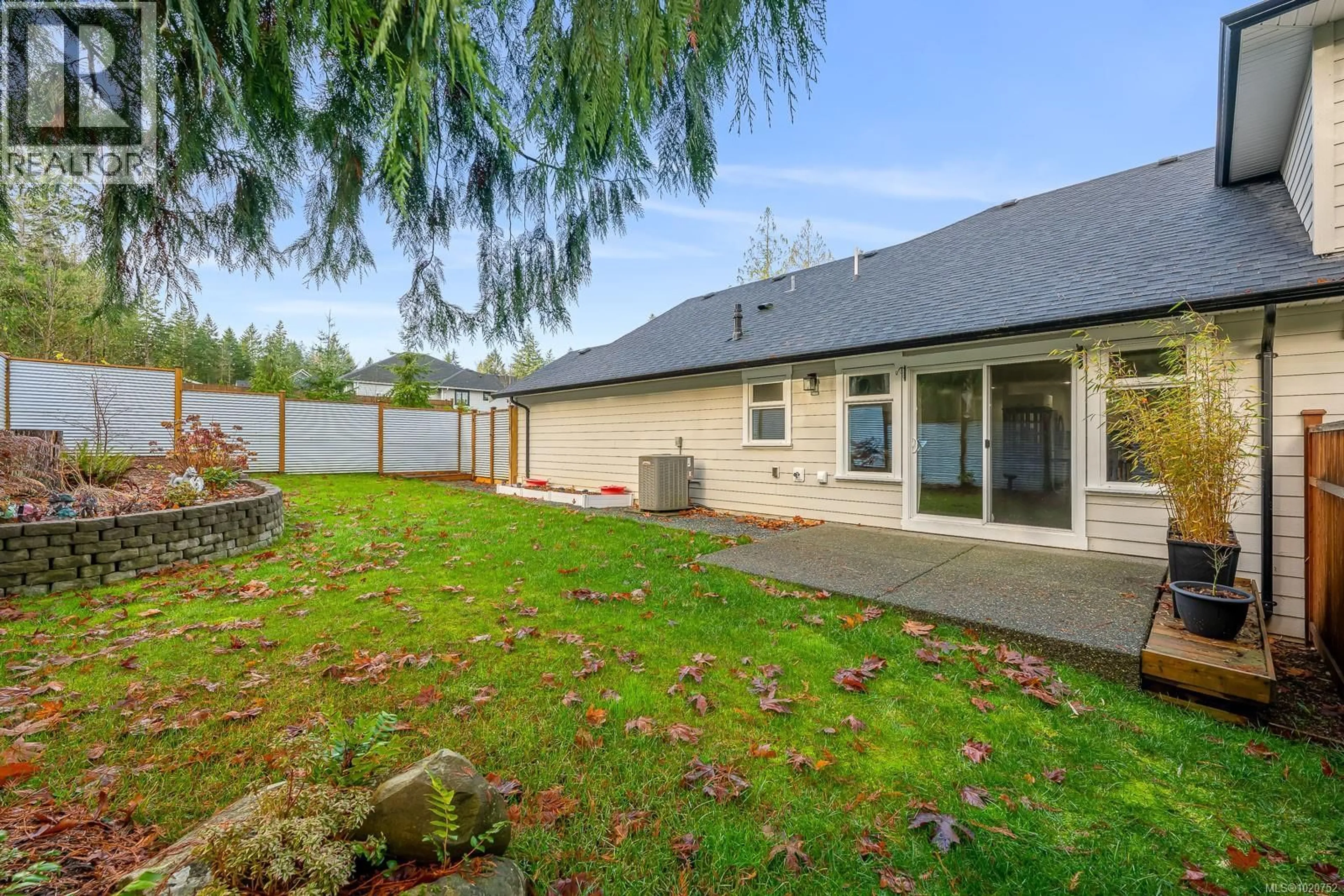 A pic from outside/outdoor area/front of a property/back of a property/a pic from drone, unknown for B - 2709 BICKLE STREET, Courtenay British Columbia V9N0C8