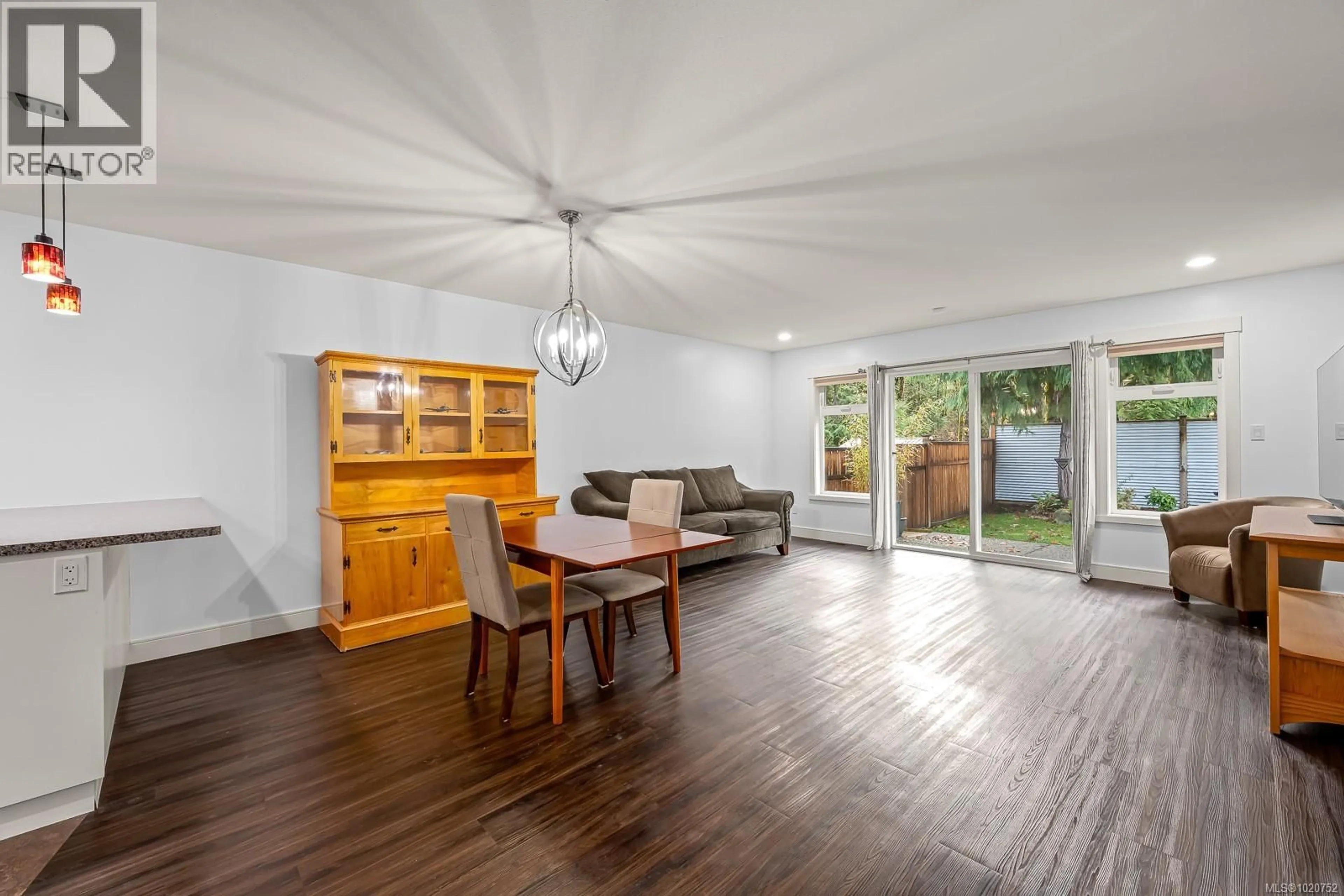 Living room with furniture, wood/laminate floor for B - 2709 BICKLE STREET, Courtenay British Columbia V9N0C8