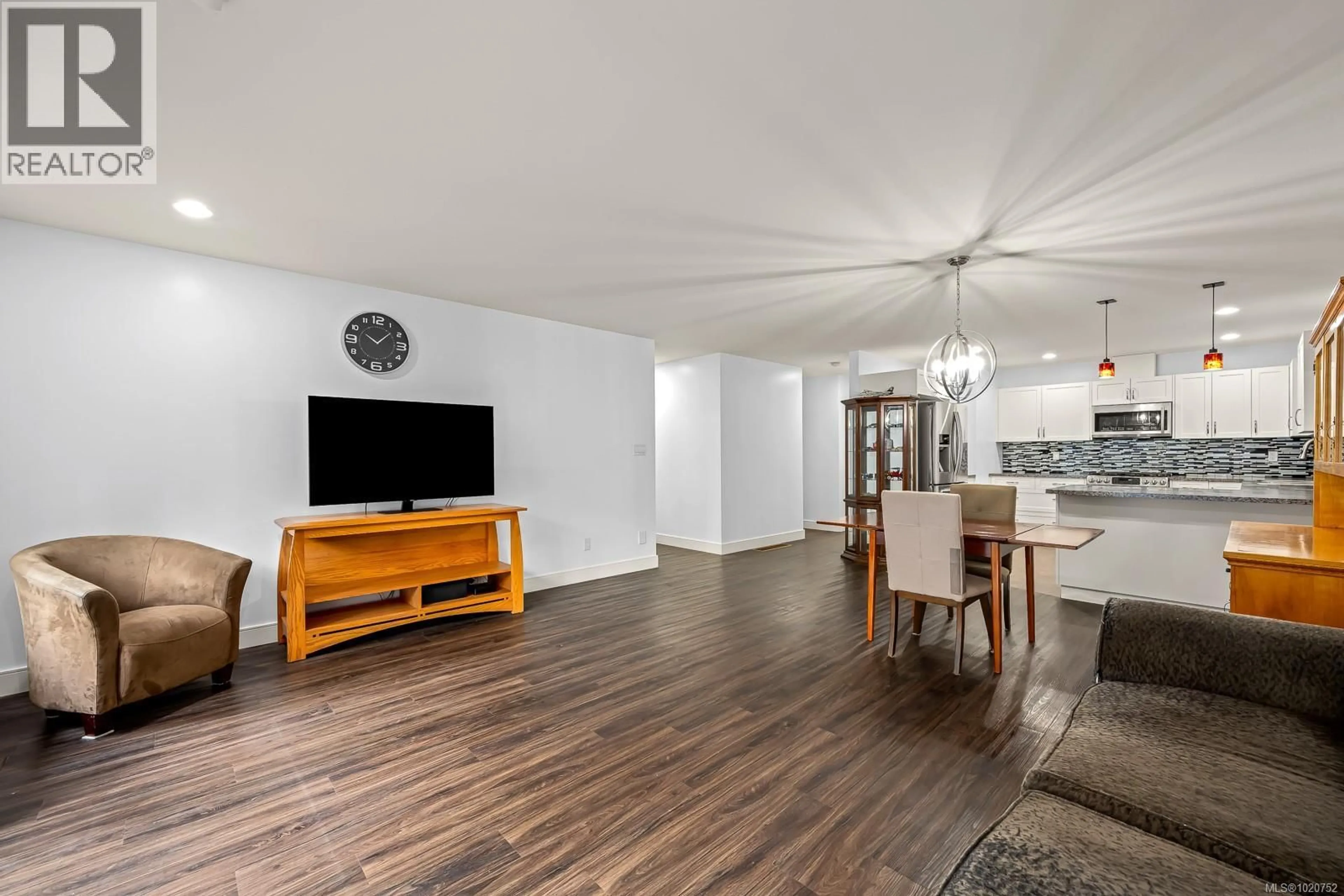 Living room with furniture, wood/laminate floor for B - 2709 BICKLE STREET, Courtenay British Columbia V9N0C8