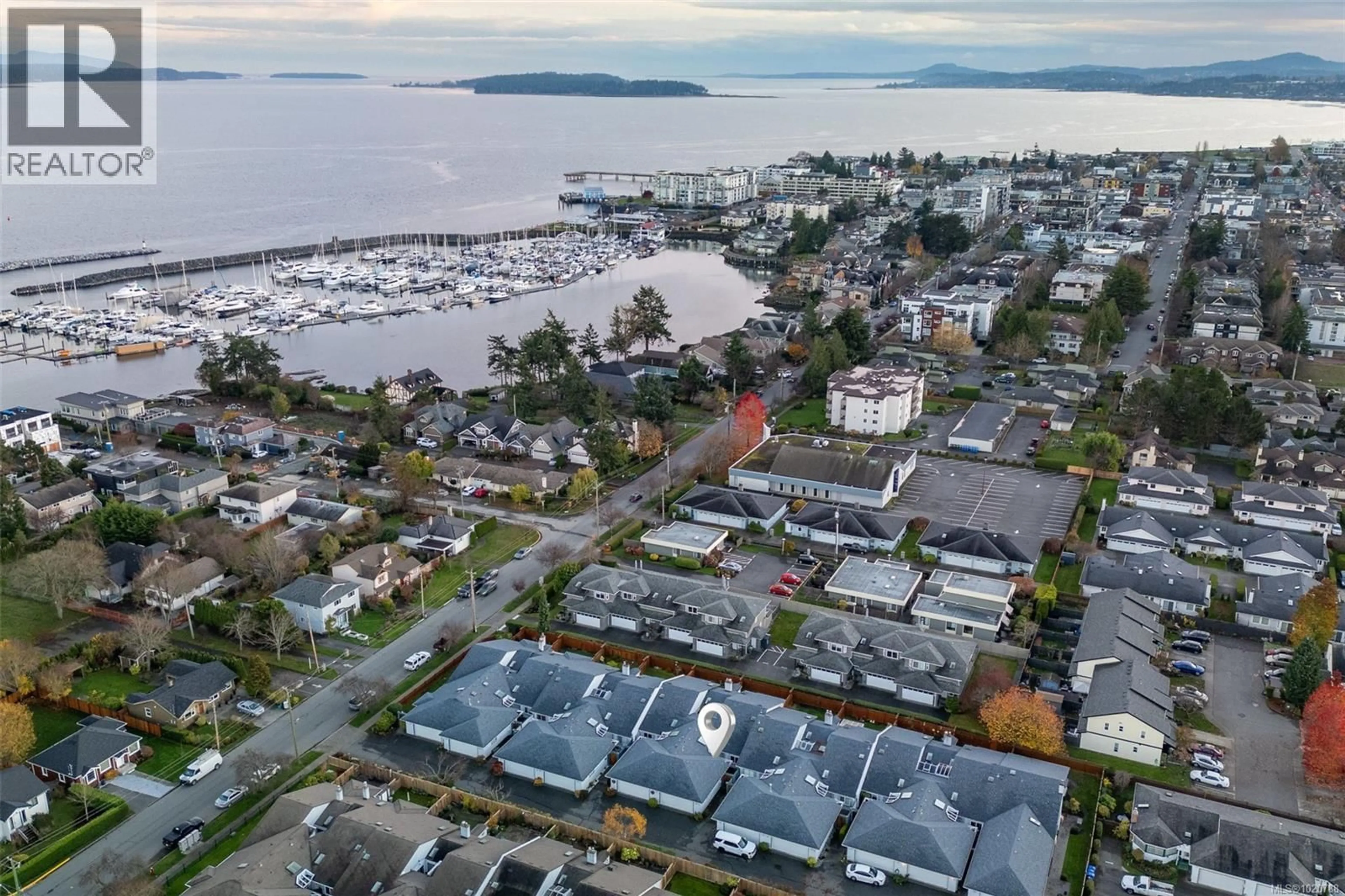 A pic from outside/outdoor area/front of a property/back of a property/a pic from drone, water/lake/river/ocean view for 6 - 10084 THIRD STREET, Sidney British Columbia V8L3B3