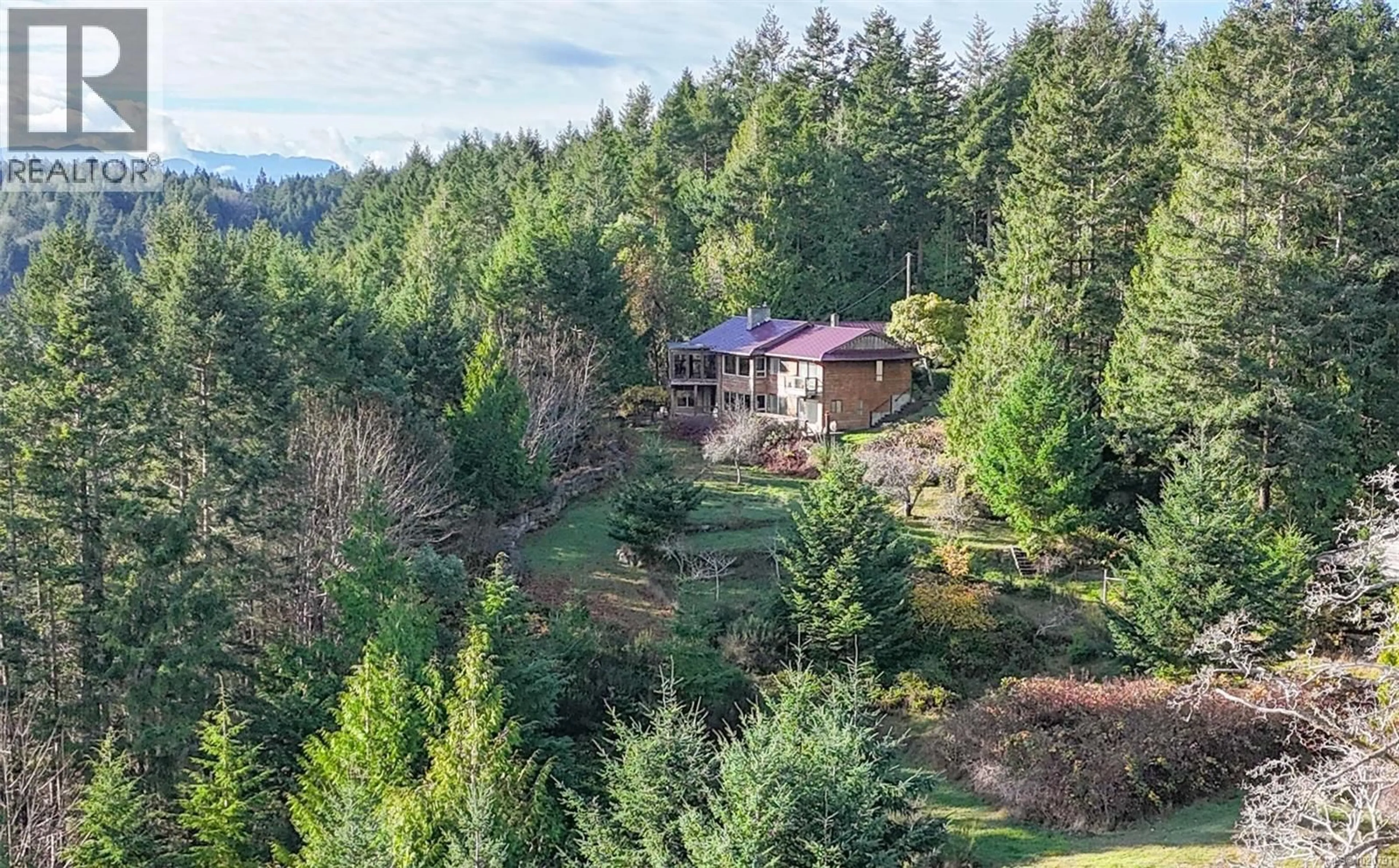 A pic from outside/outdoor area/front of a property/back of a property/a pic from drone, forest/trees view for 835 CHELWOOD ROAD, Gabriola Island British Columbia V0R1X1