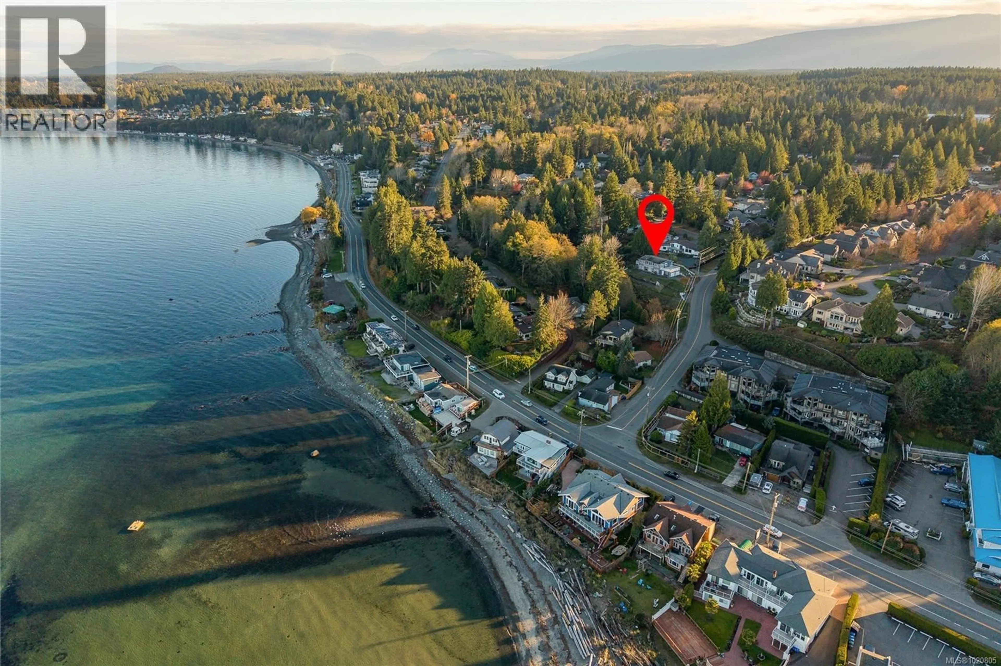 A pic from outside/outdoor area/front of a property/back of a property/a pic from drone, water/lake/river/ocean view for 350 GARRETT ROAD, Qualicum Beach British Columbia V9K1H4
