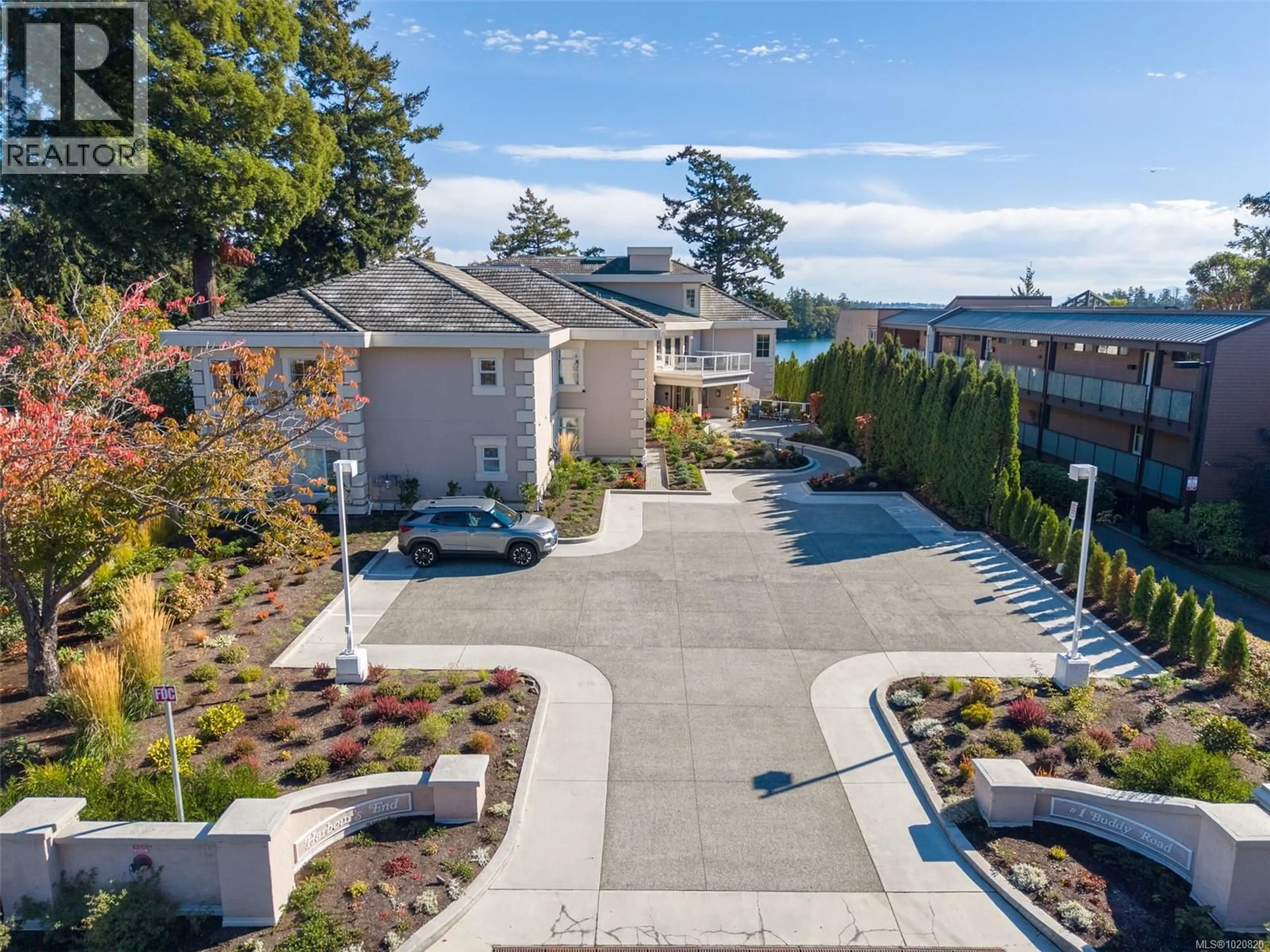 A pic from outside/outdoor area/front of a property/back of a property/a pic from drone, street for 306 - 1 BUDDY ROAD, View Royal British Columbia V9B1V6