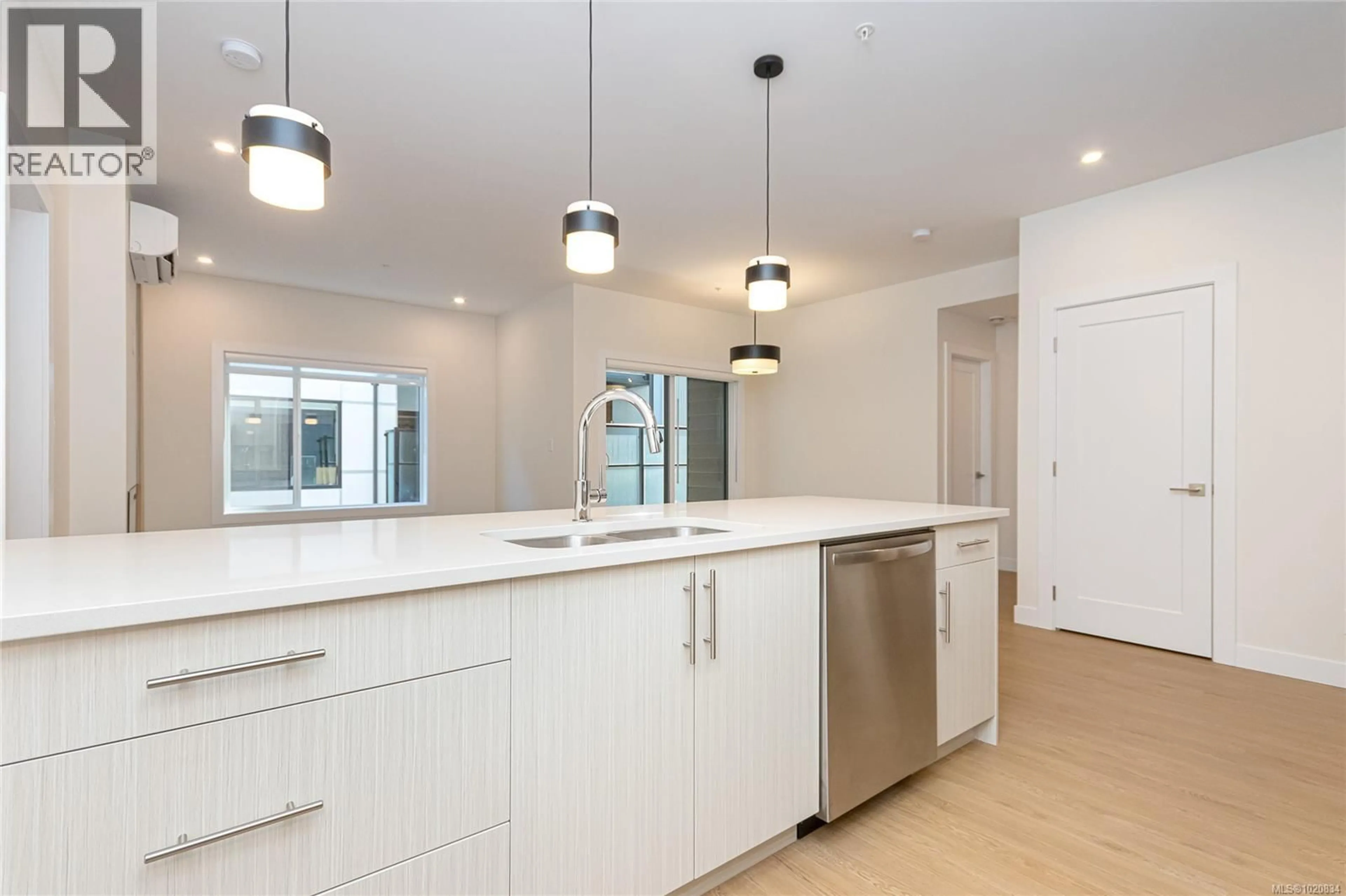 Open concept kitchen, unknown for 402 - 924 JENKINS AVENUE, Langford British Columbia V9B2N7