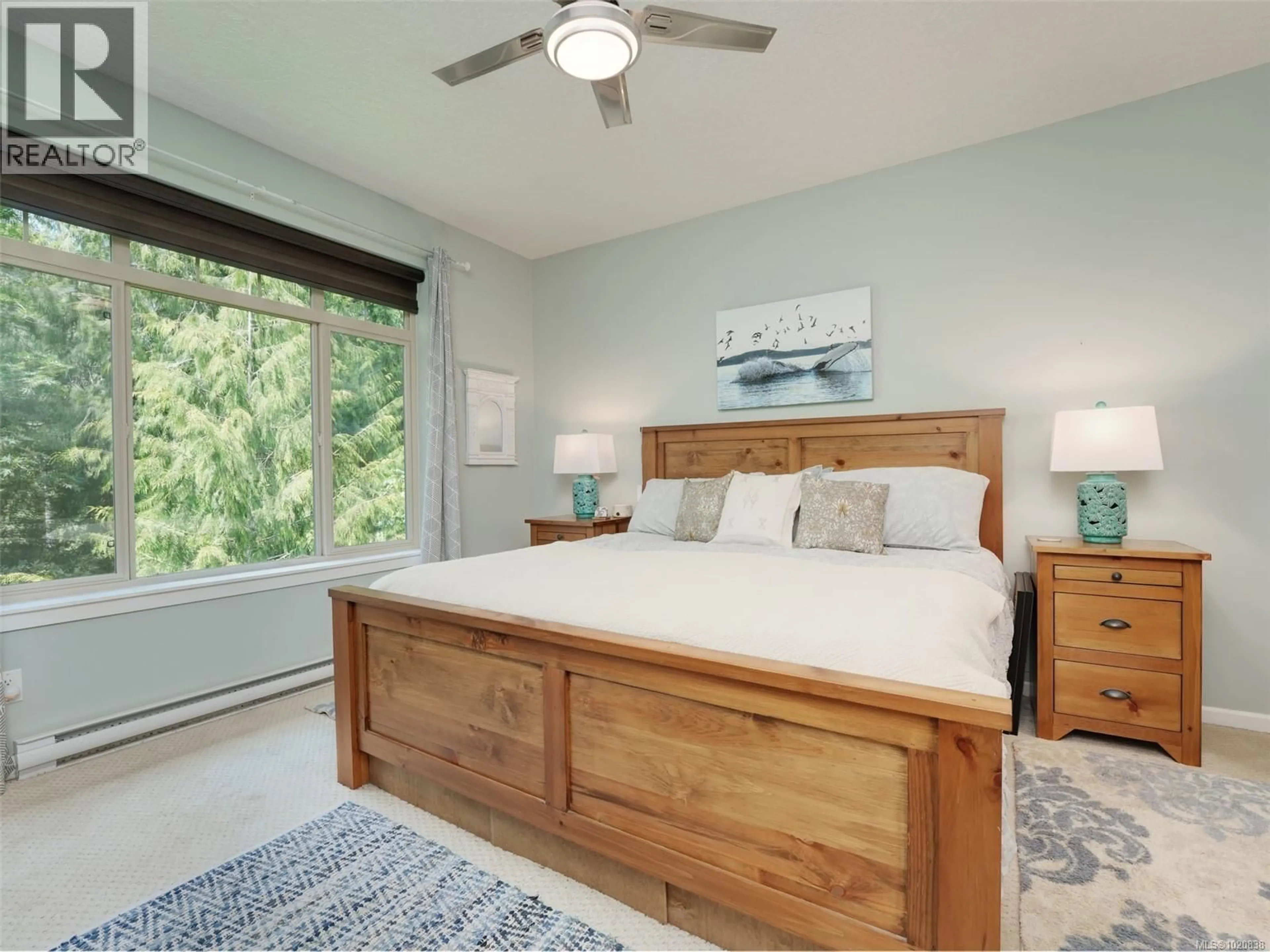 Bedroom with bed, wood/laminate floor for 11 - 2363 DEMAMIEL DRIVE, Sooke British Columbia V9Z1K3