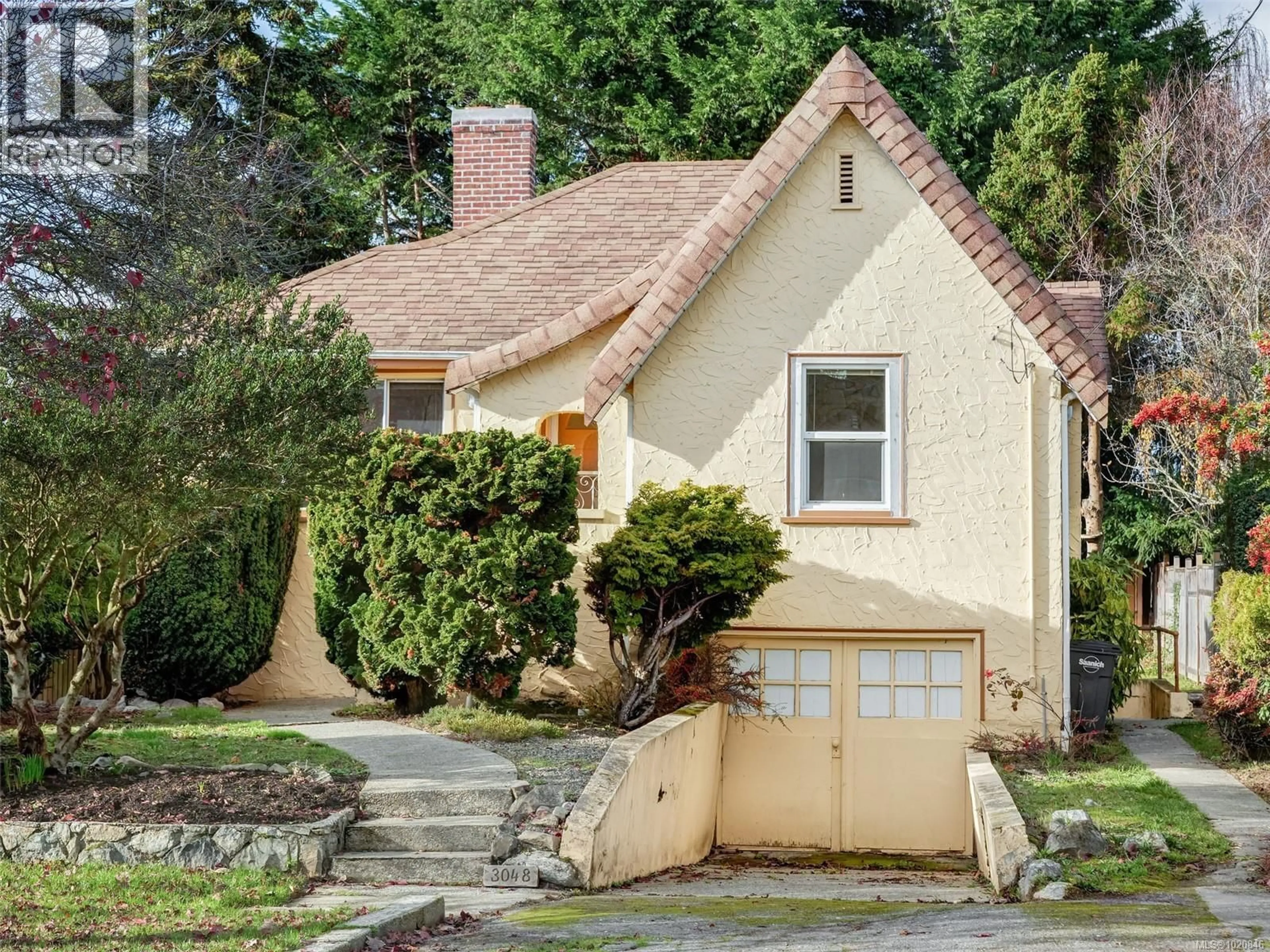 Home with brick exterior material, street for 3048 EARL GREY STREET, Saanich British Columbia V9A1W7