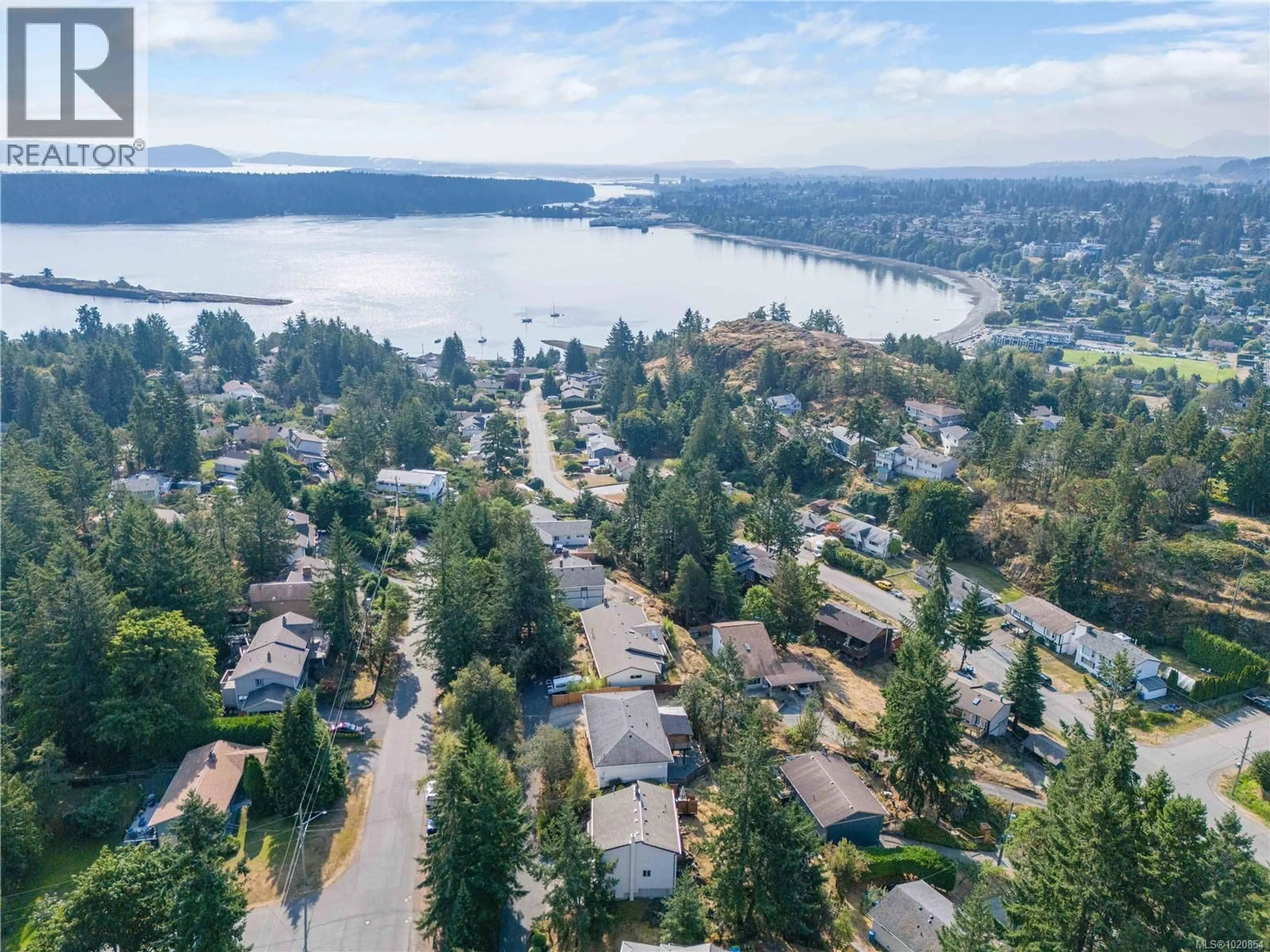 A pic from outside/outdoor area/front of a property/back of a property/a pic from drone, water/lake/river/ocean view for 3132 ROBIN HOOD DRIVE, Nanaimo British Columbia V9T1P1