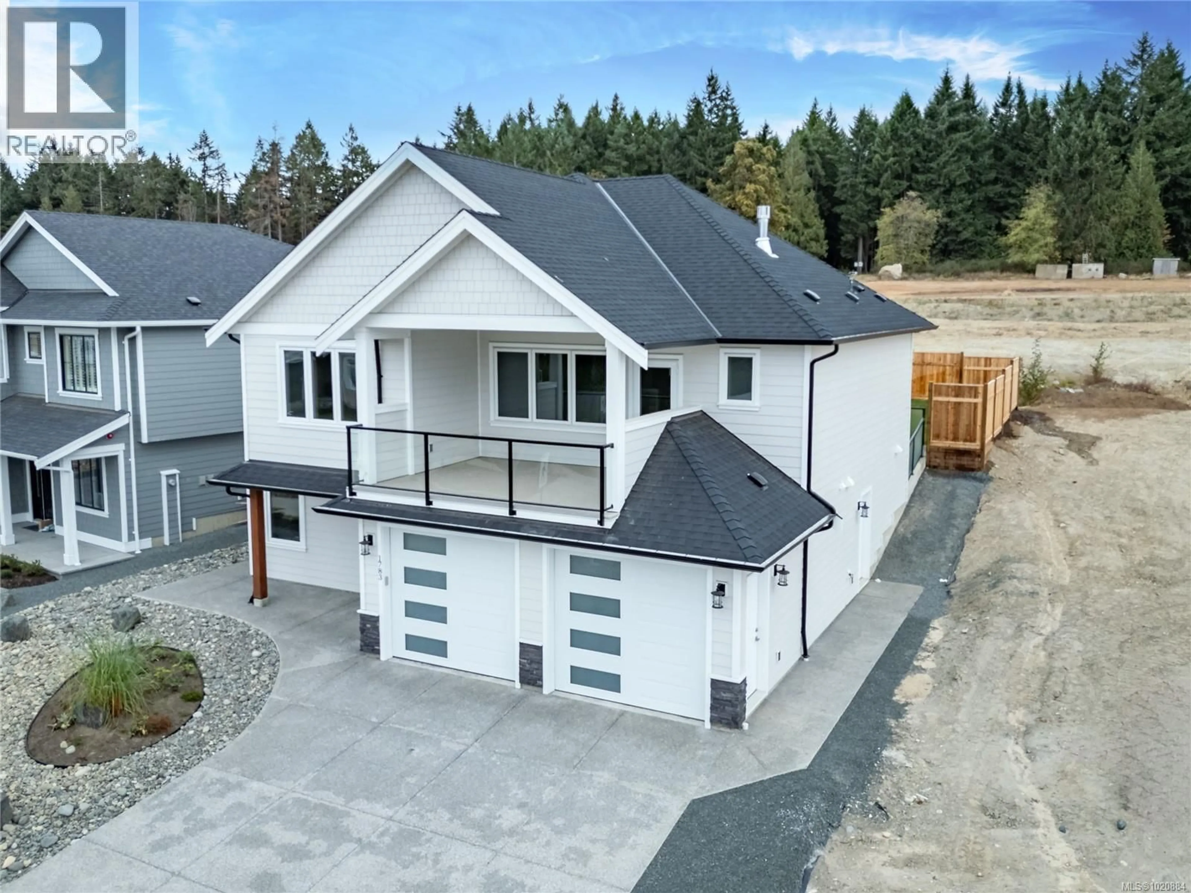 A pic from outside/outdoor area/front of a property/back of a property/a pic from drone, unknown for 1783 CROWN ISLE BOULEVARD, Courtenay British Columbia V9N9X5