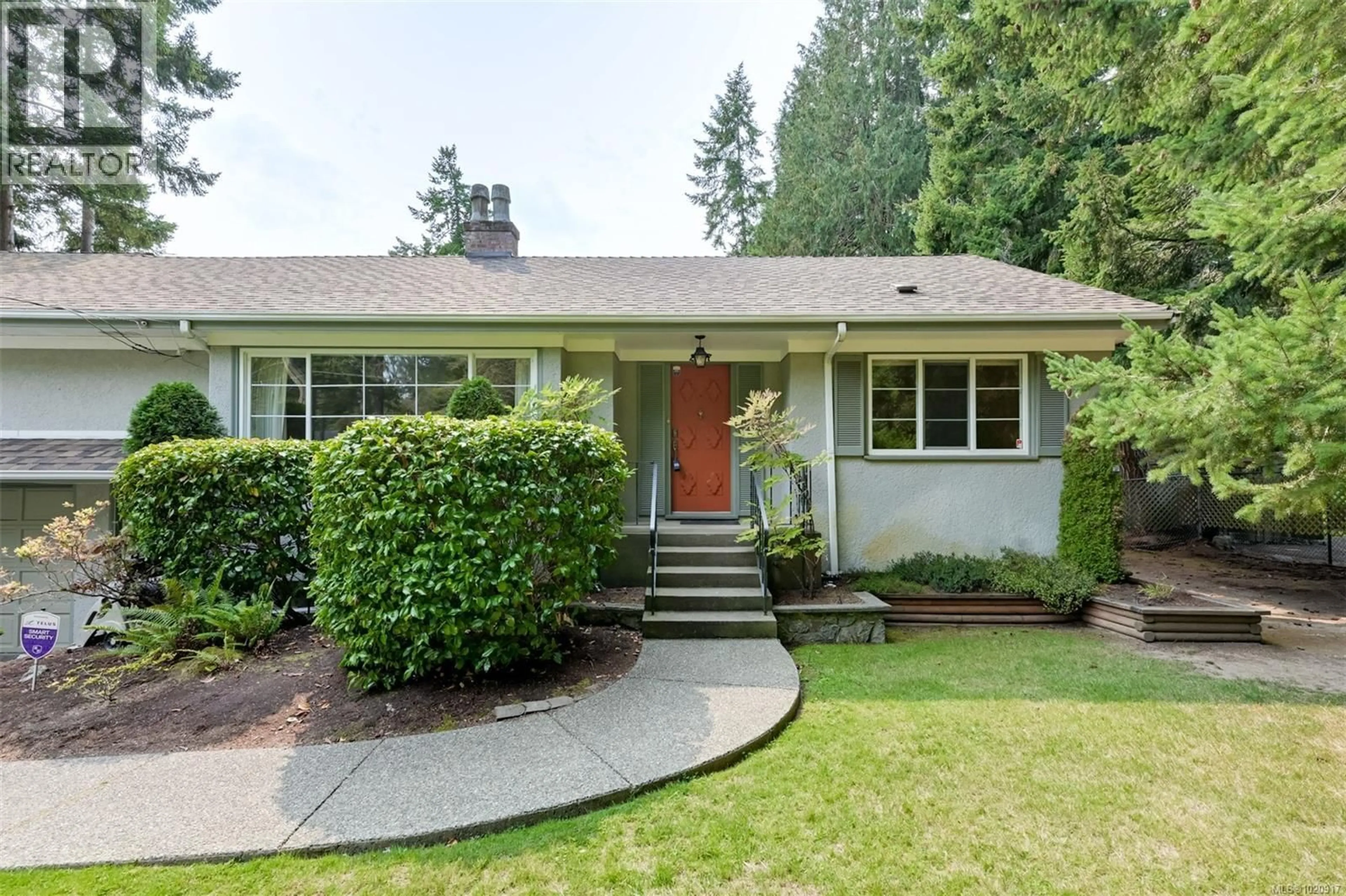 Home with vinyl exterior material, street for 2587 MACDONALD DRIVE WEST, Saanich British Columbia V8N1X7
