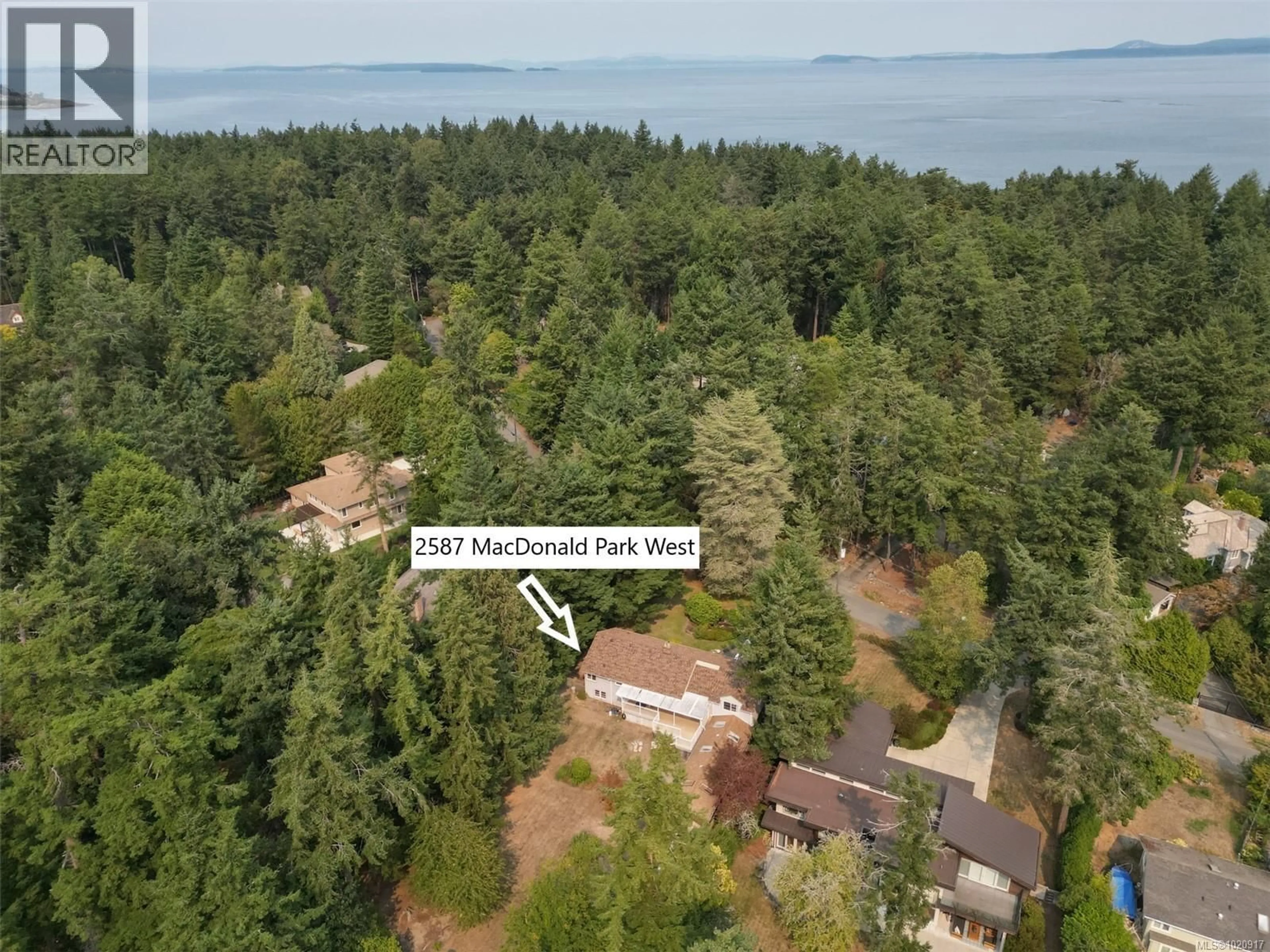 A pic from outside/outdoor area/front of a property/back of a property/a pic from drone, water/lake/river/ocean view for 2587 MACDONALD DRIVE WEST, Saanich British Columbia V8N1X7