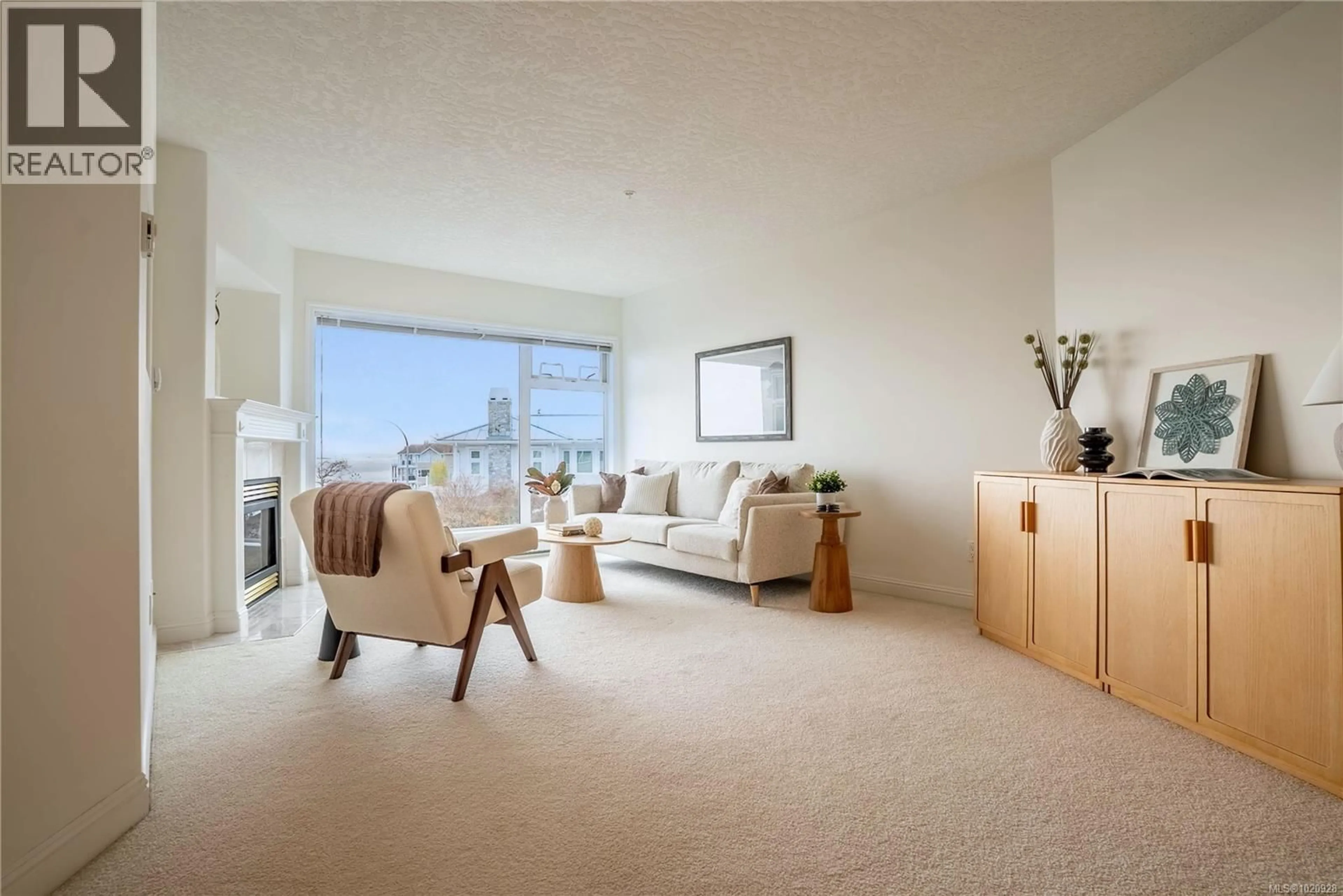 Living room with furniture, carpet floor for 308 - 2550 BEVAN AVENUE, Sidney British Columbia V8L5Y5