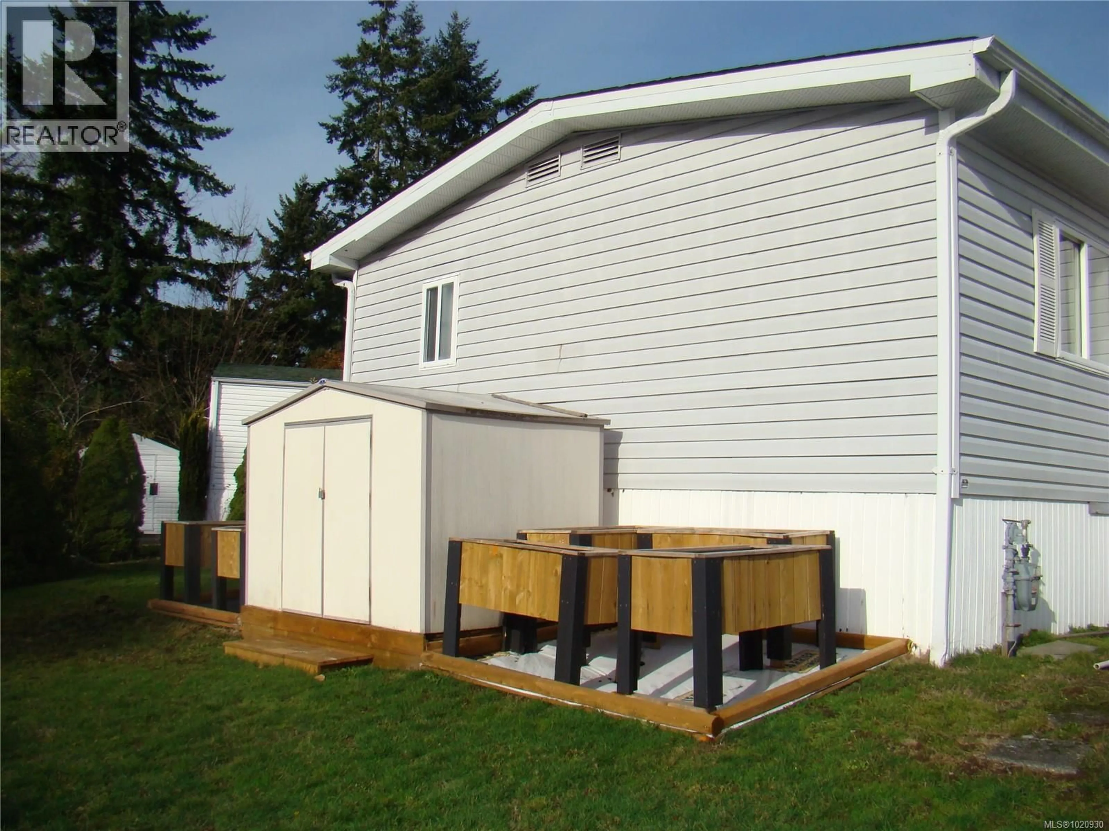 Home with vinyl exterior material, street for 25 - 2501 LABIEUX ROAD, Nanaimo British Columbia V9T5X3