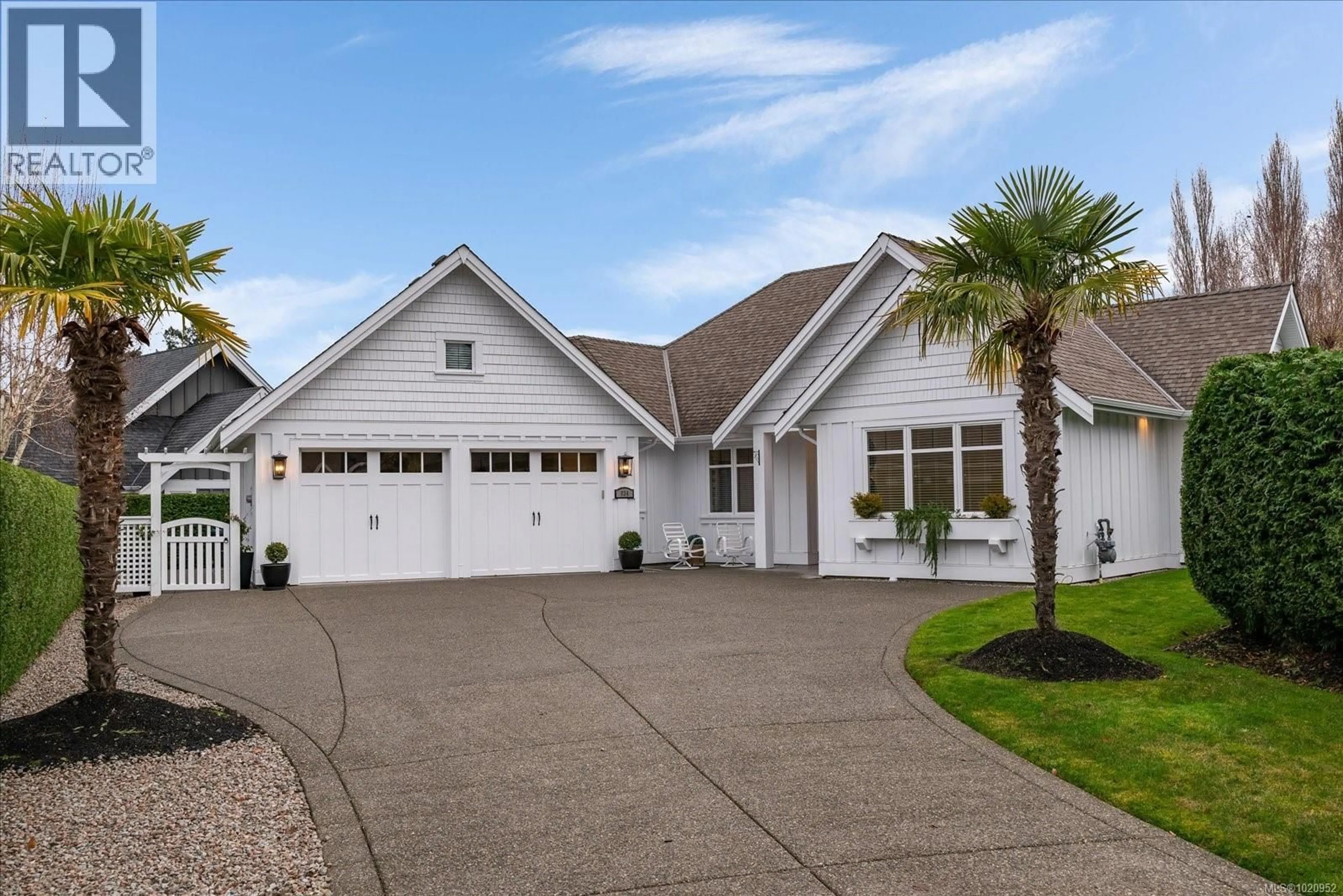 Home with vinyl exterior material, street for 834 BLUFFS DRIVE, Qualicum Beach British Columbia V9K0A2