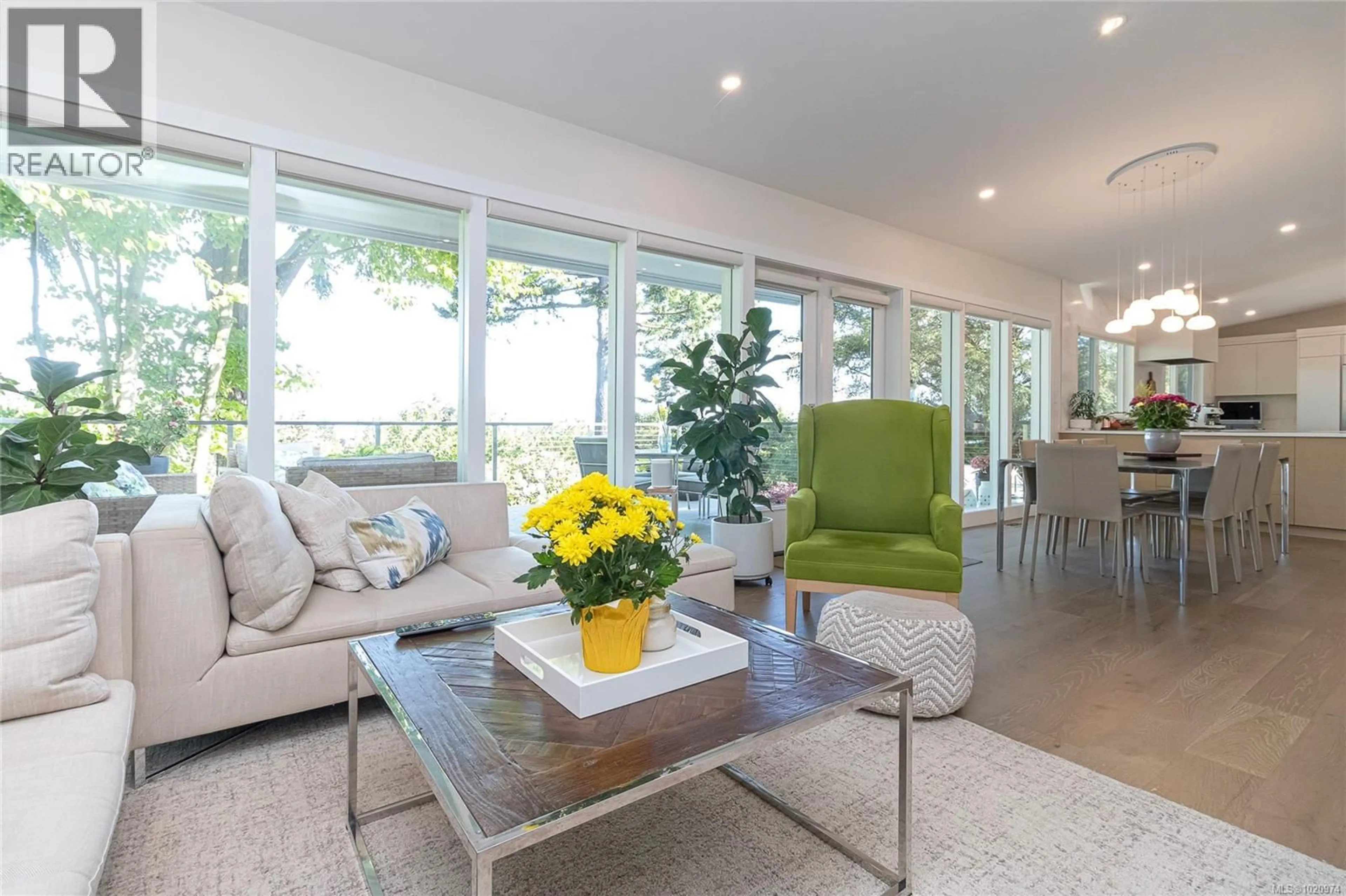 Living room with furniture, unknown for 4516 DUART ROAD, Saanich British Columbia V8N3K2