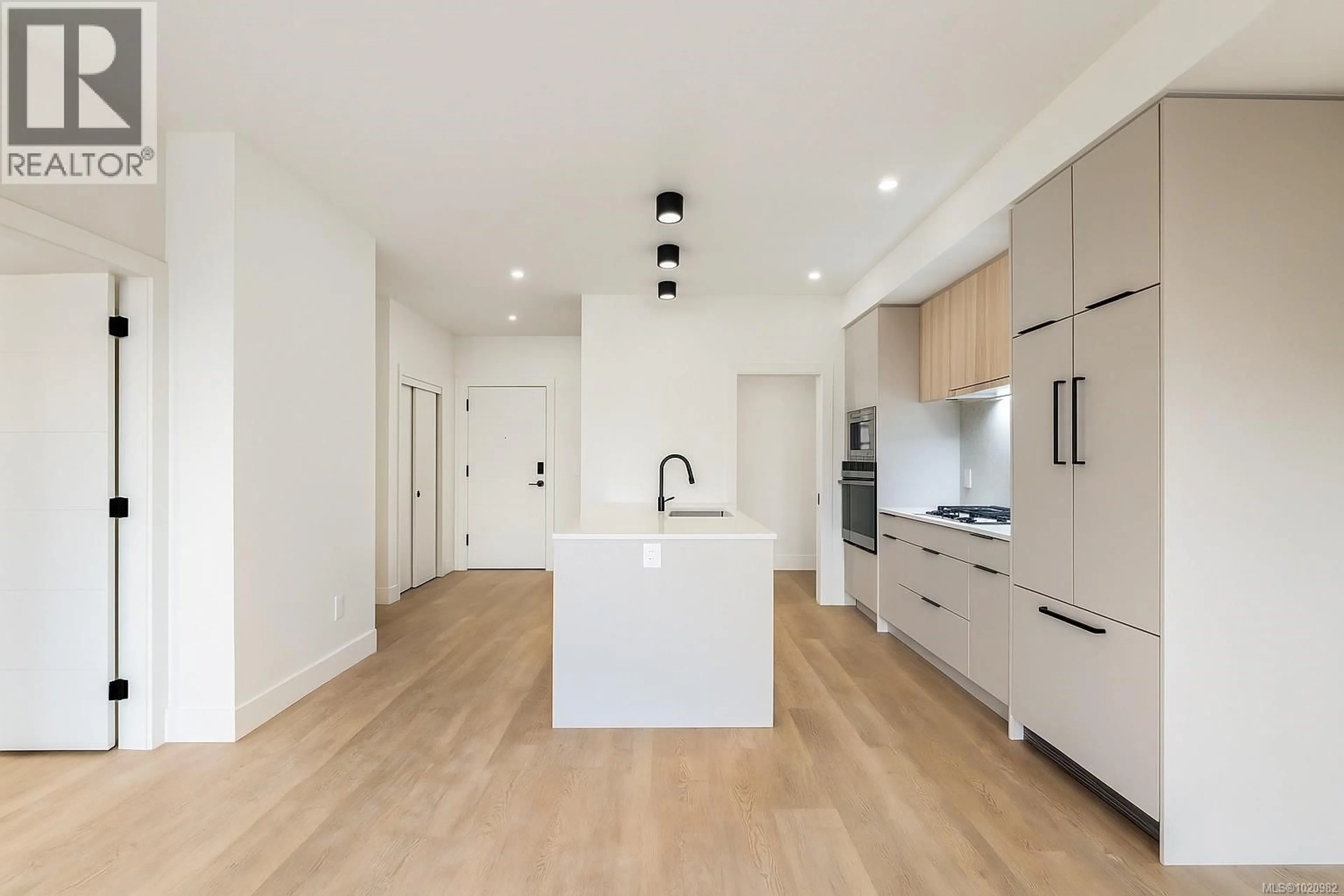 Open concept kitchen, unknown for 605 - 2341 BEAR MOUNTAIN PARKWAY, Langford British Columbia V9B6V1