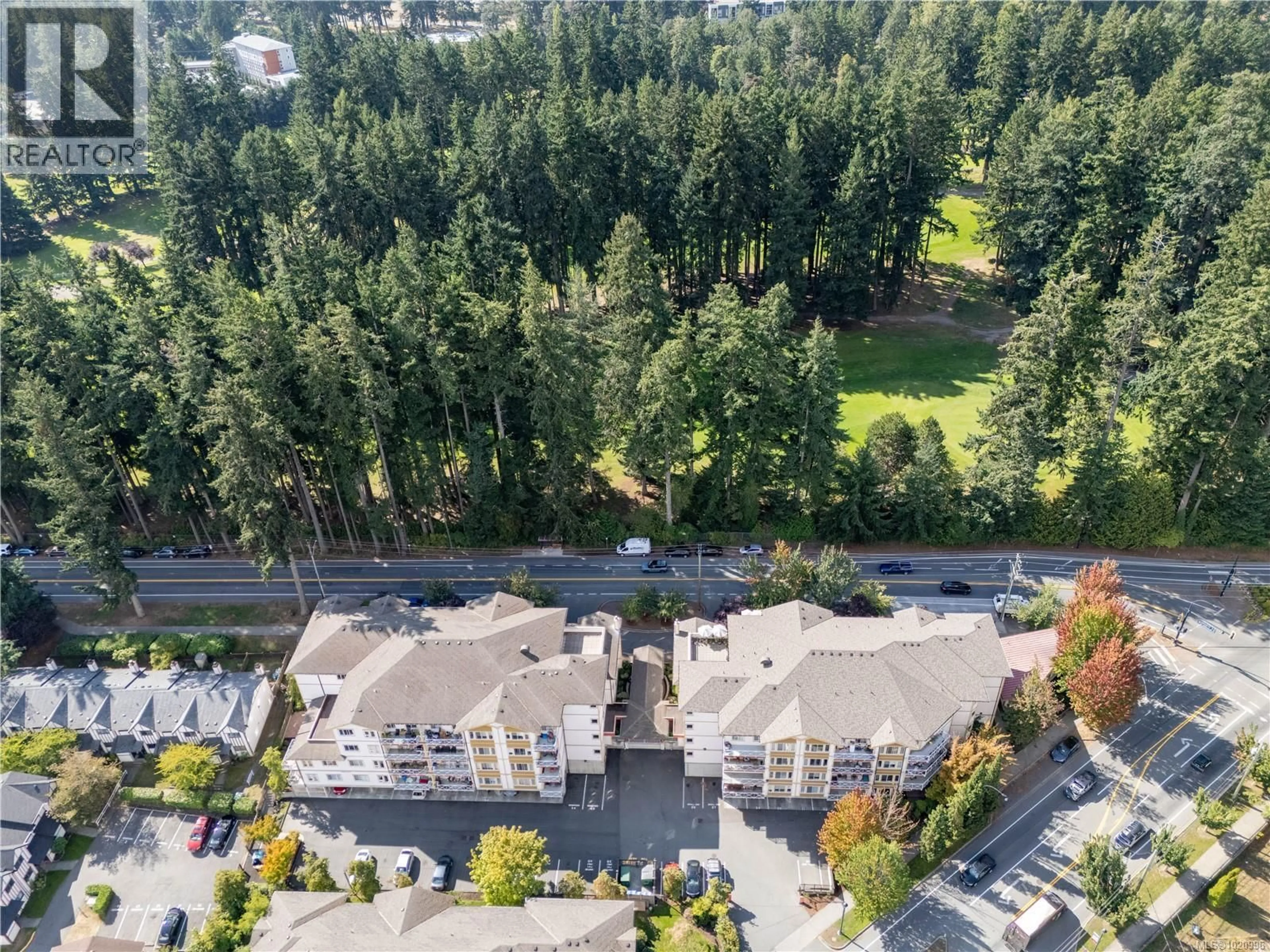 A pic from outside/outdoor area/front of a property/back of a property/a pic from drone, forest/trees view for 402 - 364 GOLDSTREAM AVENUE, Colwood British Columbia V9B2W3