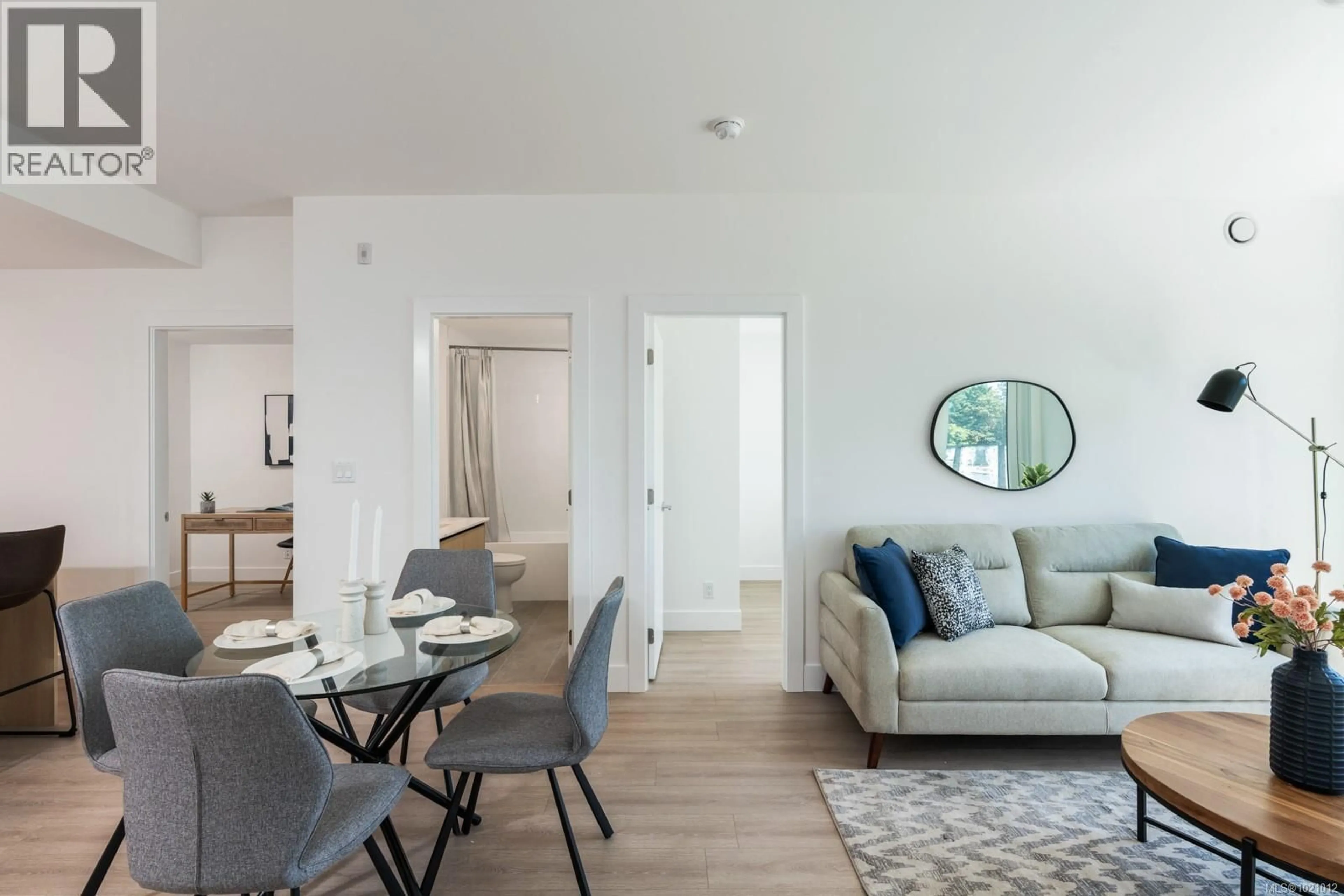 Living room with furniture, unknown for 606 - 258 HELMCKEN ROAD, View Royal British Columbia X0X0X0