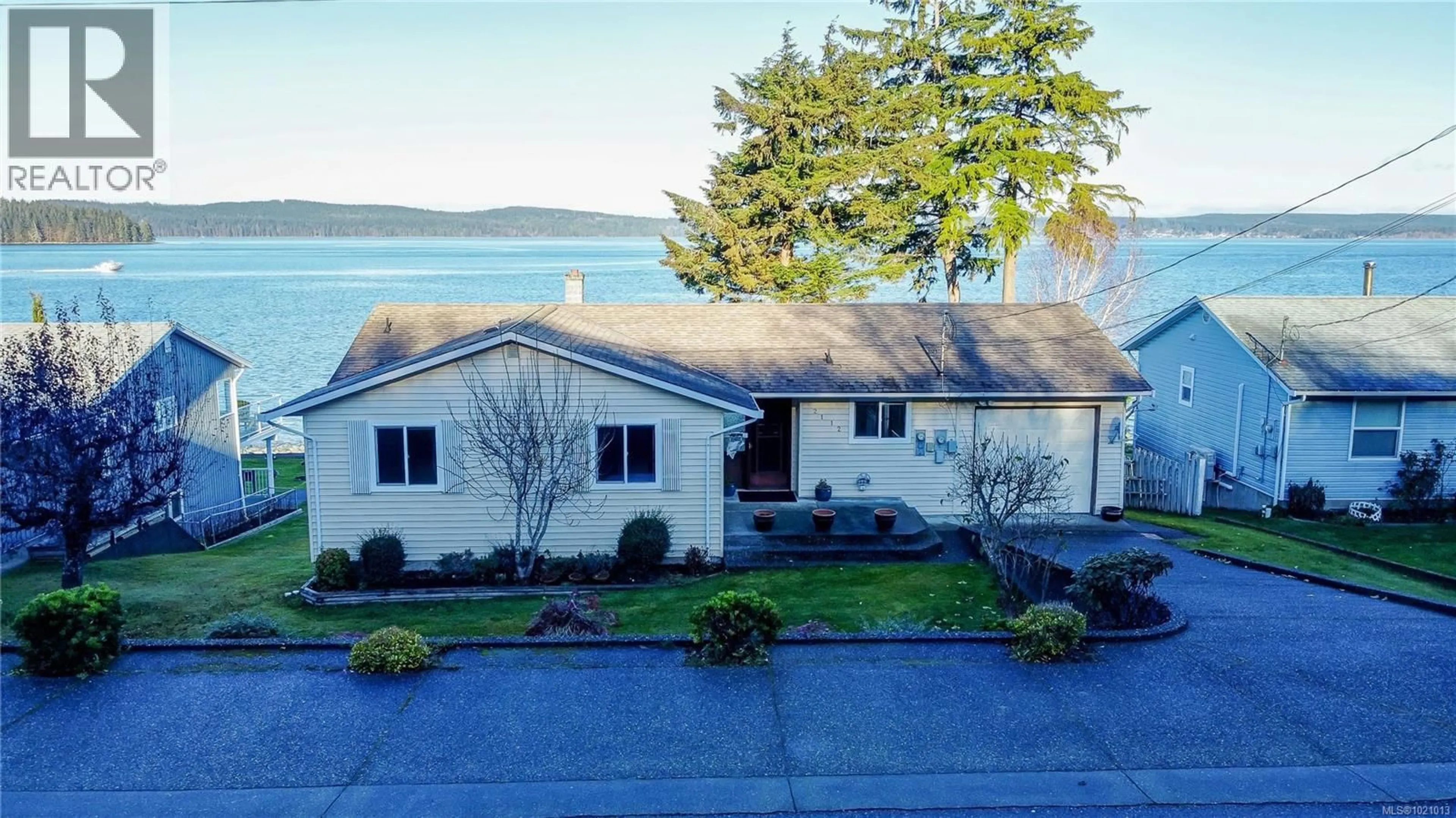 A pic from outside/outdoor area/front of a property/back of a property/a pic from drone, water/lake/river/ocean view for 2112 BEACH DRIVE, Port McNeill British Columbia V0N2R0