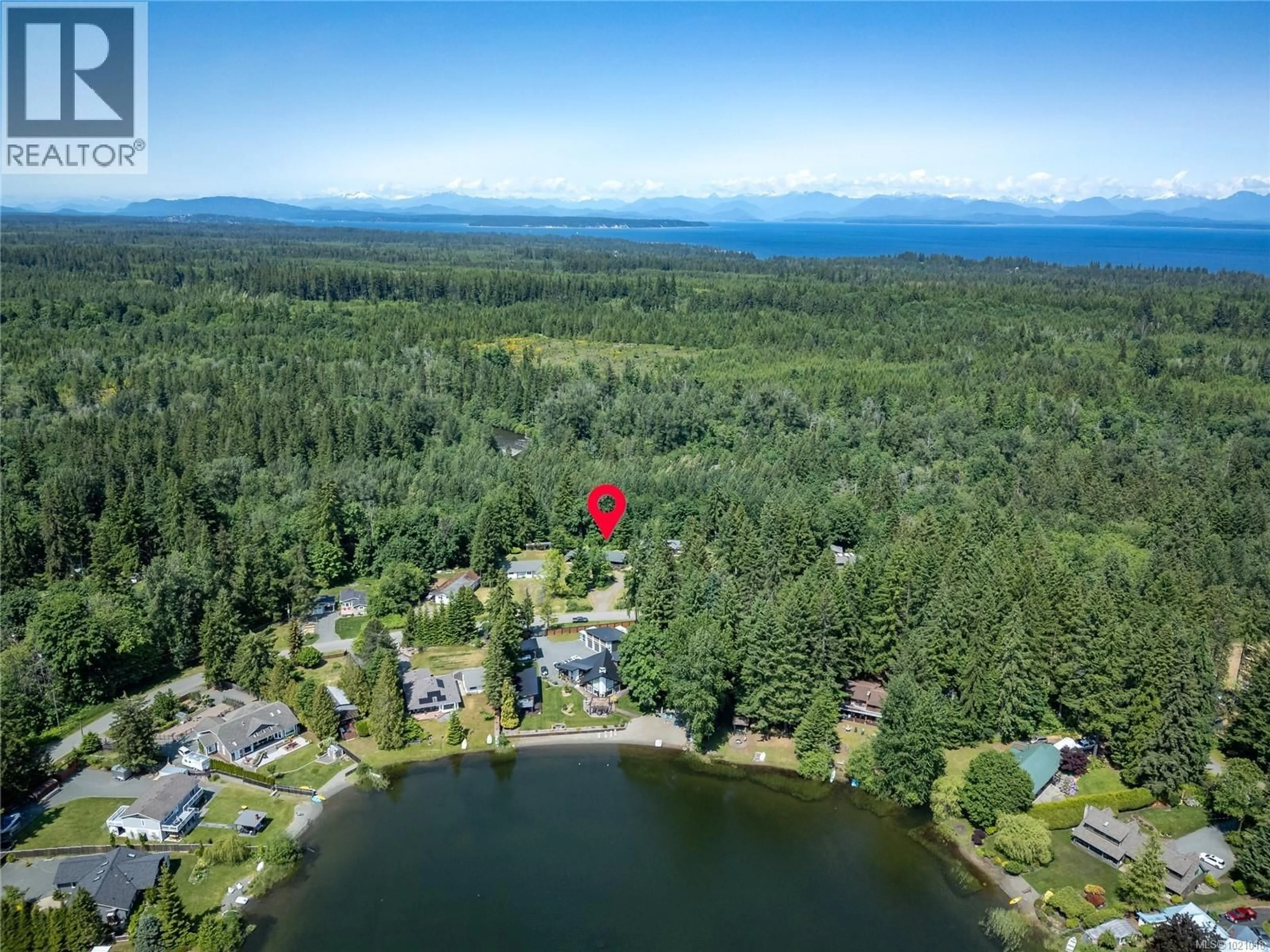 A pic from outside/outdoor area/front of a property/back of a property/a pic from drone, water/lake/river/ocean view for 9437 MARTIN PARK DRIVE, Black Creek British Columbia V9J1C3