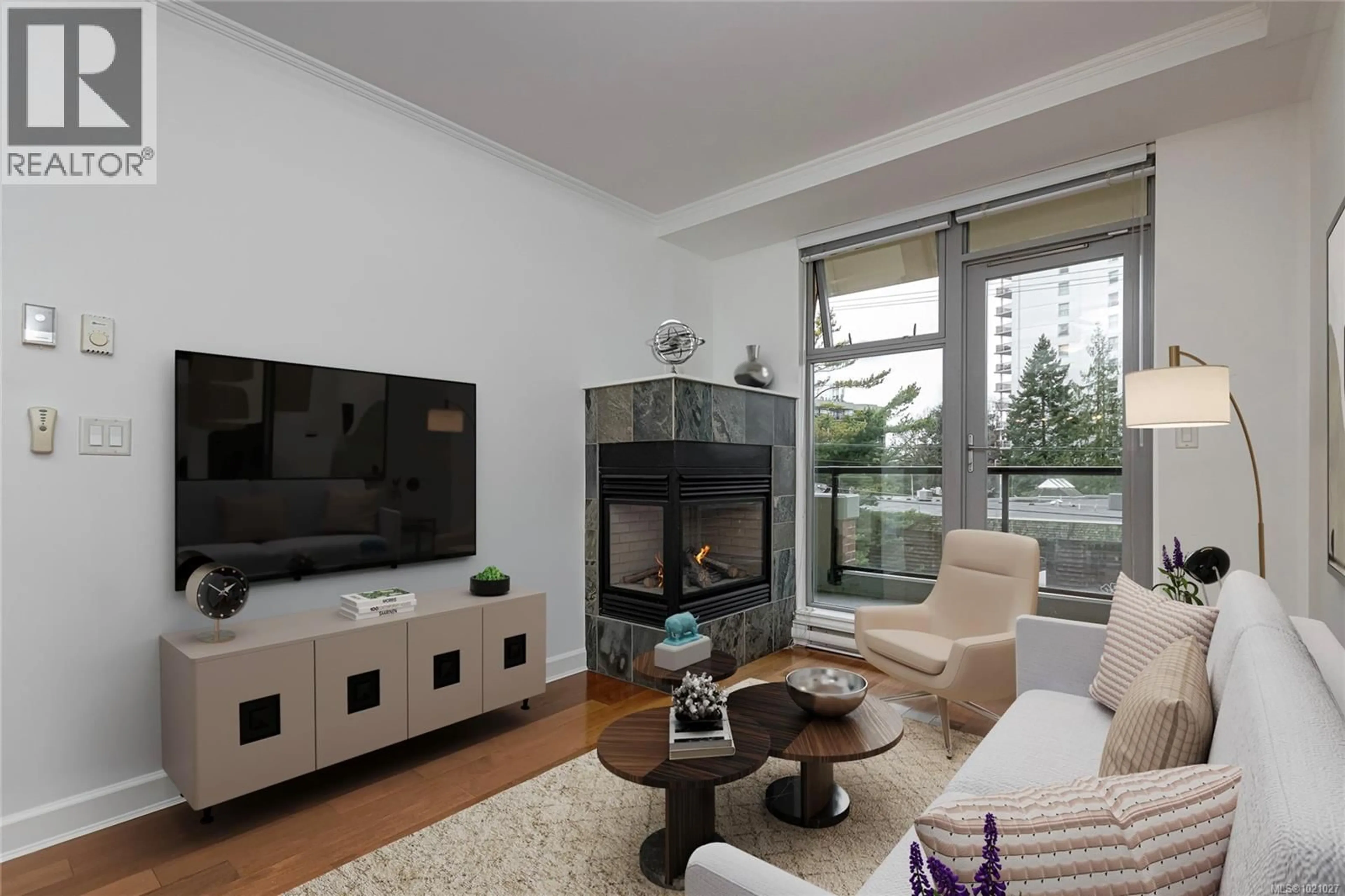 Living room with furniture, wood/laminate floor for 307 - 225 MENZIES STREET, Victoria British Columbia V8V2G6