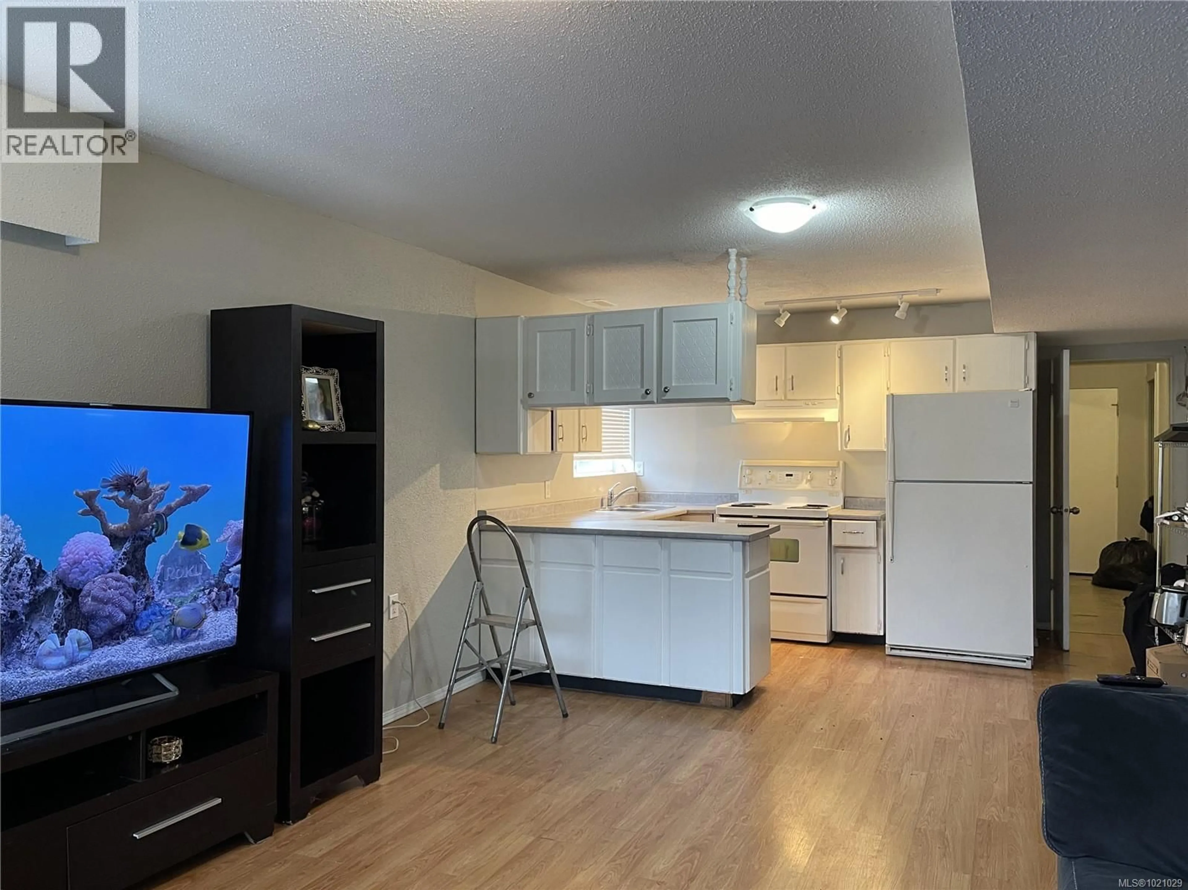 Open concept kitchen, wood/laminate floor for 4436 REDFORD STREET, Port Alberni British Columbia V9Y3R1