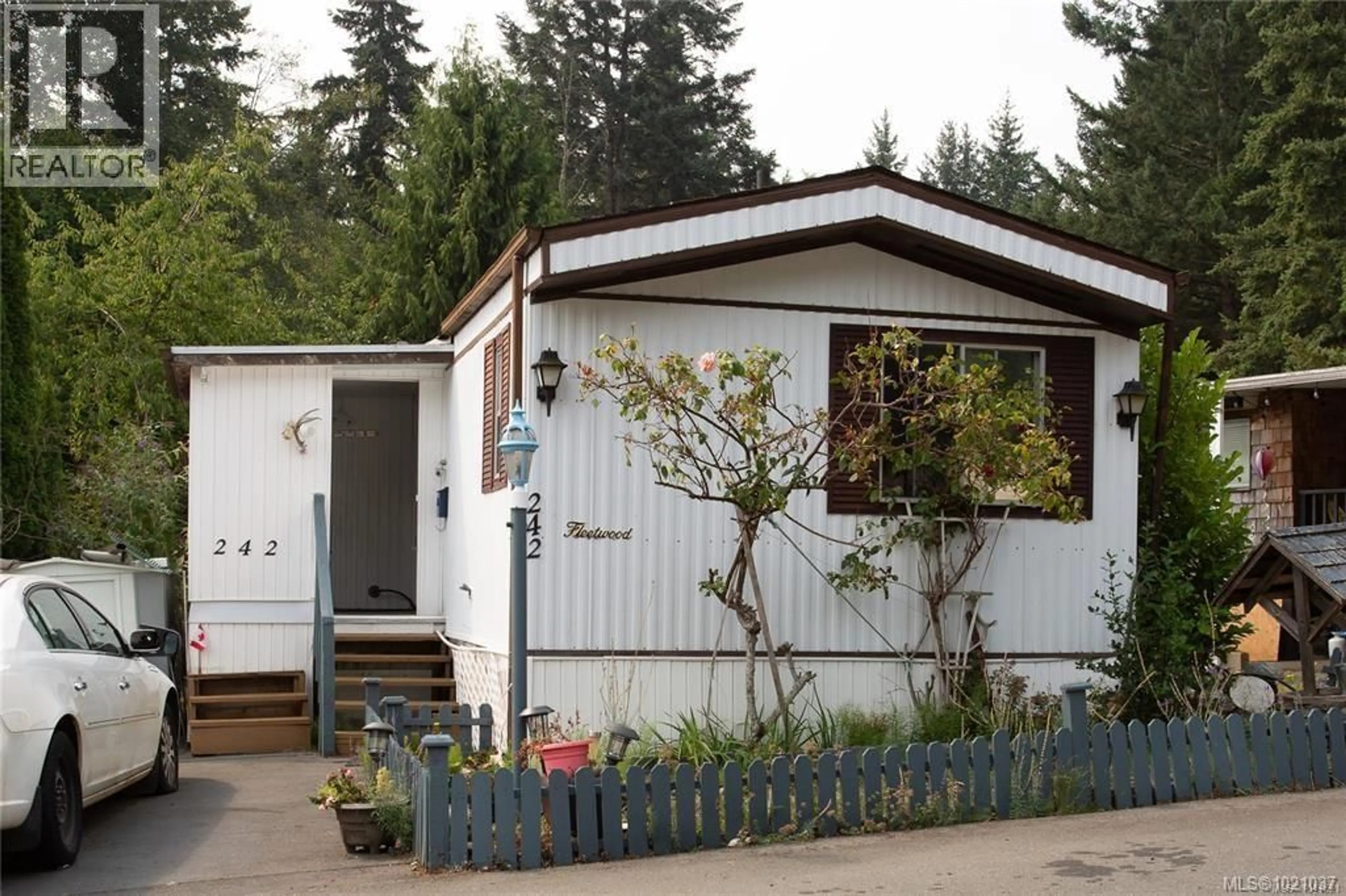 Home with vinyl exterior material, street for 242 - 2465 APOLLO DRIVE, Nanoose Bay British Columbia V9P9K2