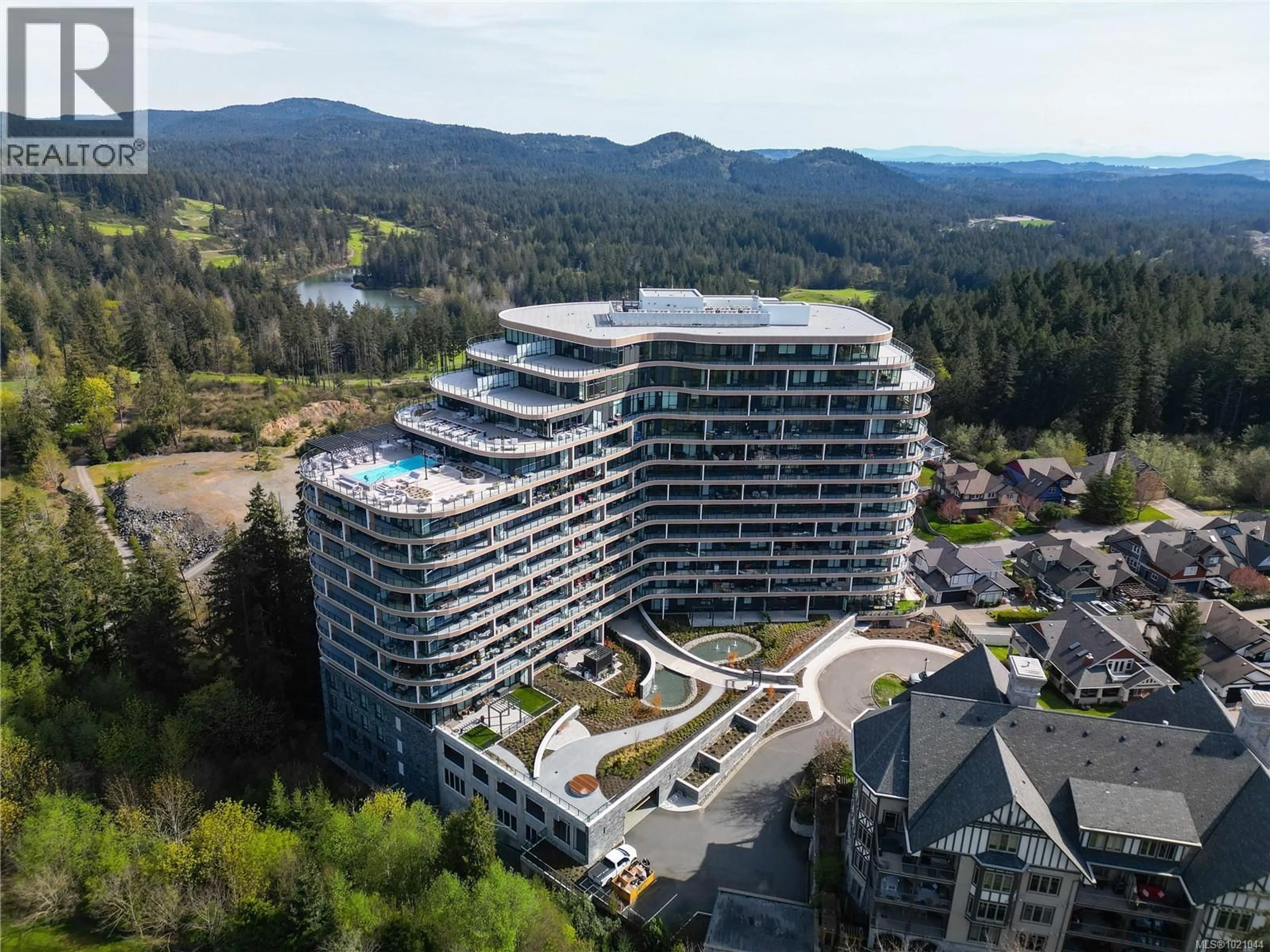 A pic from outside/outdoor area/front of a property/back of a property/a pic from drone, mountain view for 1402 - 2000 HANNINGTON ROAD, Langford British Columbia V9B6R6