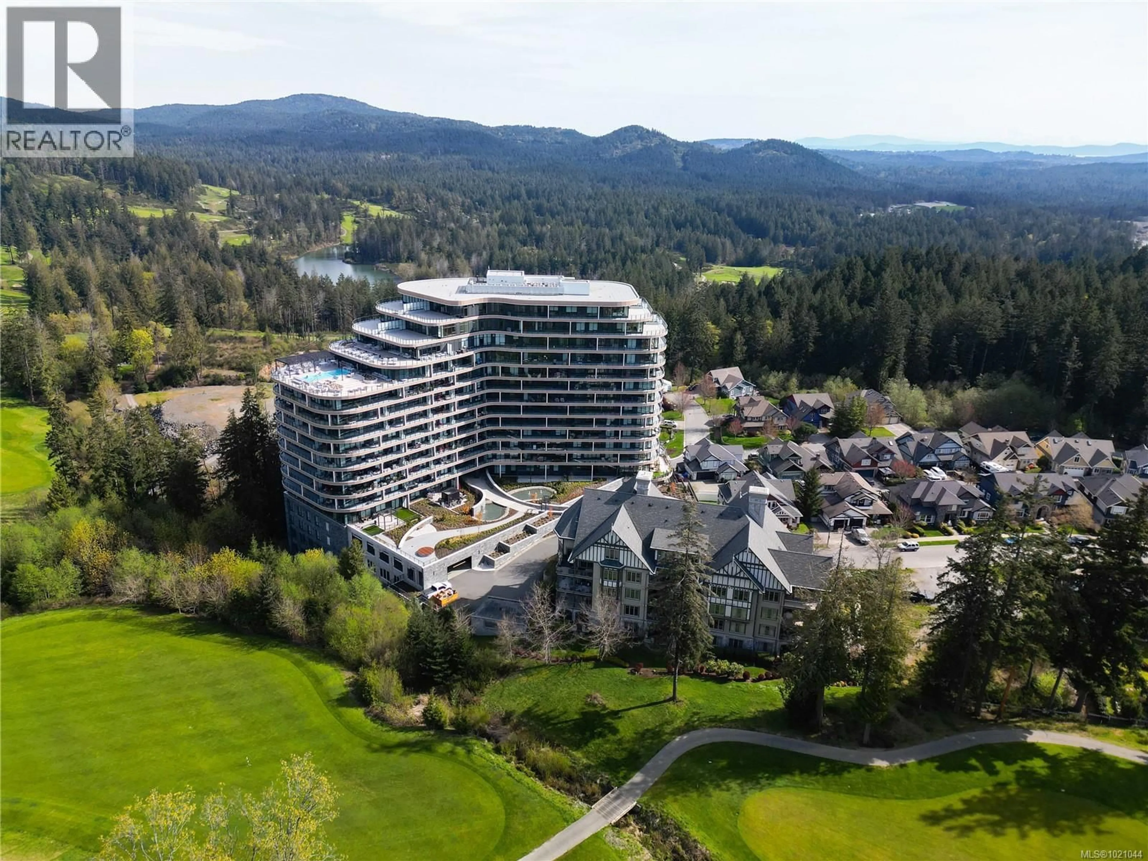 A pic from outside/outdoor area/front of a property/back of a property/a pic from drone, mountain view for 1402 - 2000 HANNINGTON ROAD, Langford British Columbia V9B6R6