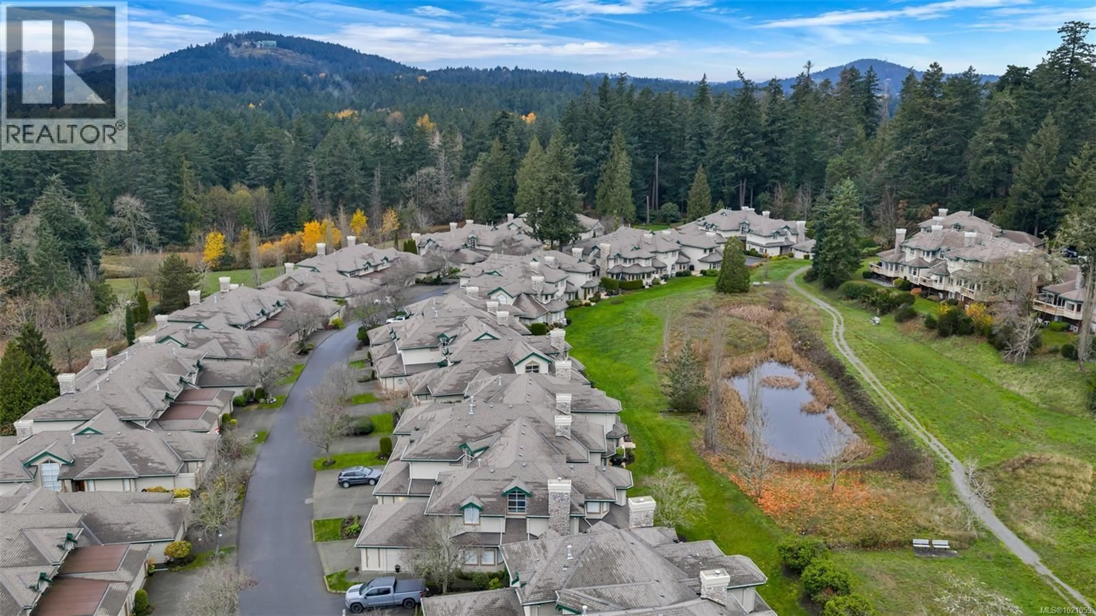 A pic from outside/outdoor area/front of a property/back of a property/a pic from drone, unknown for 98 - 530 MARSETT PLACE, Saanich British Columbia V8Z7J2