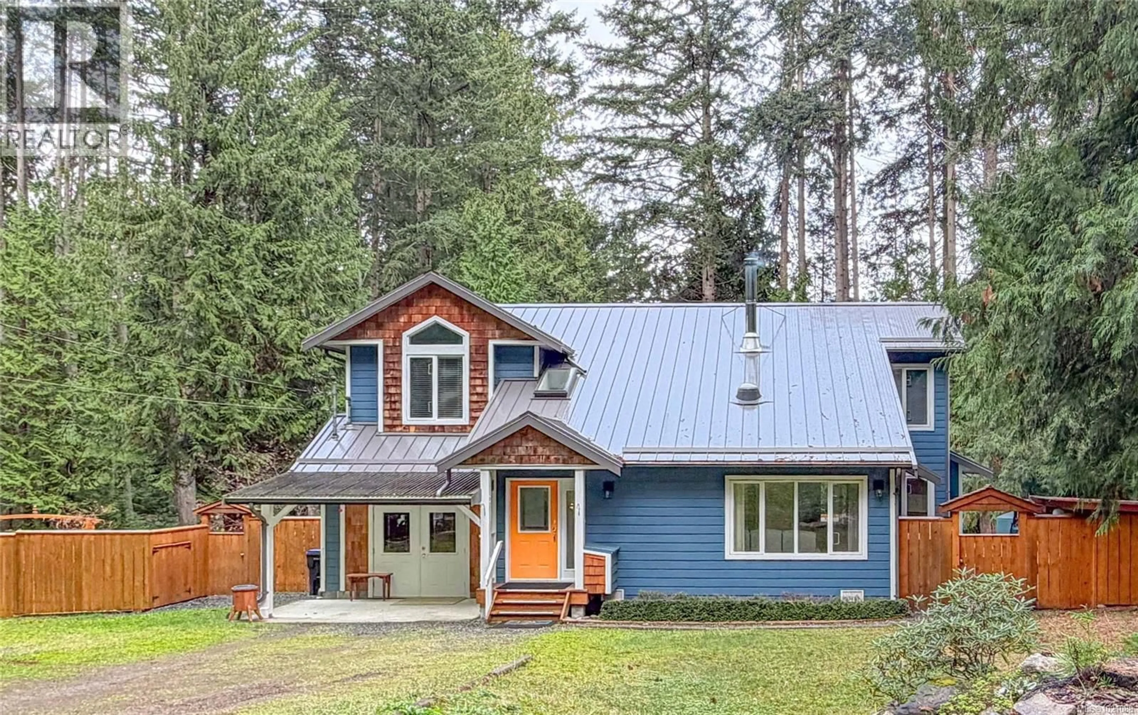 Home with vinyl exterior material, street for 720 CLARENDON ROAD, Gabriola Island British Columbia V0R1X1