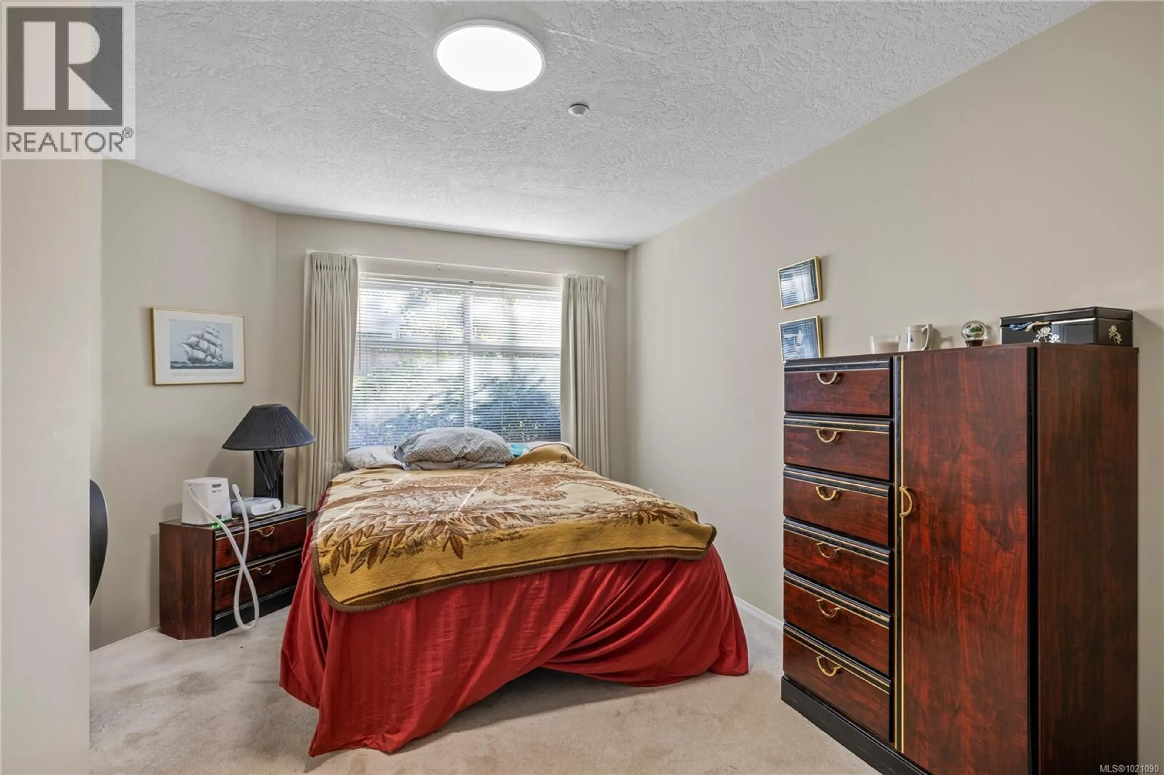 Bedroom with bed, carpet floor for 108 - 354 MORISON AVENUE, Parksville British Columbia V9P2V3