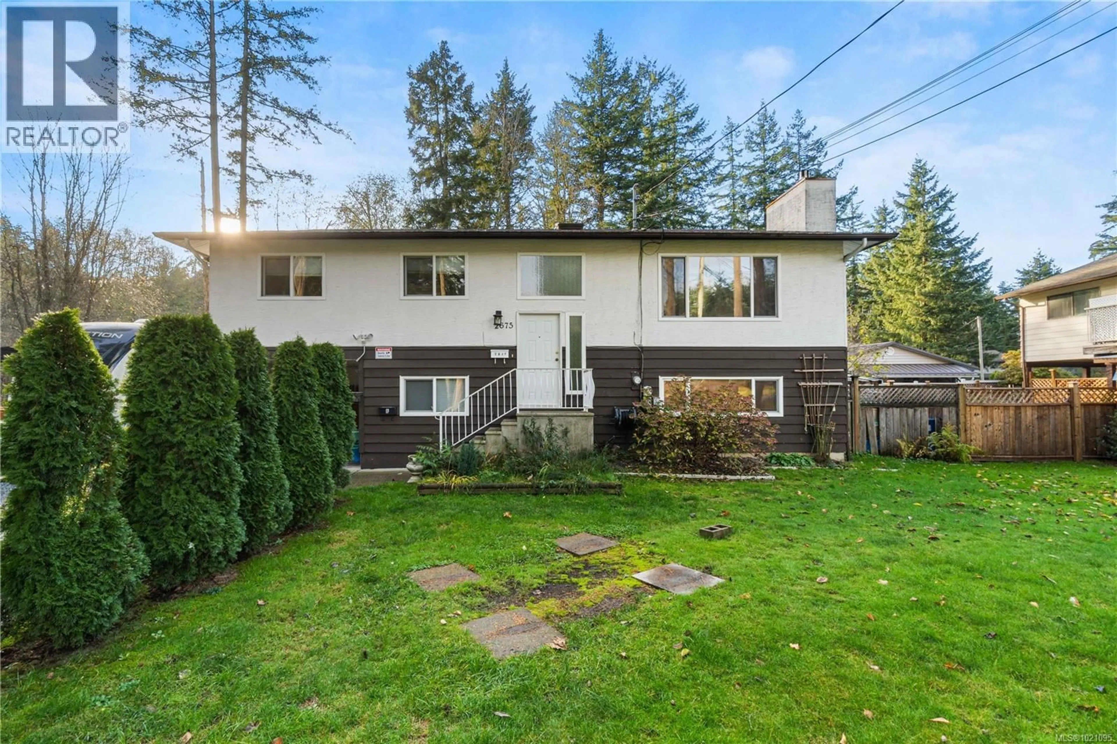 A pic from outside/outdoor area/front of a property/back of a property/a pic from drone, street for 2675 LABIEUX ROAD, Nanaimo British Columbia V9T3N3