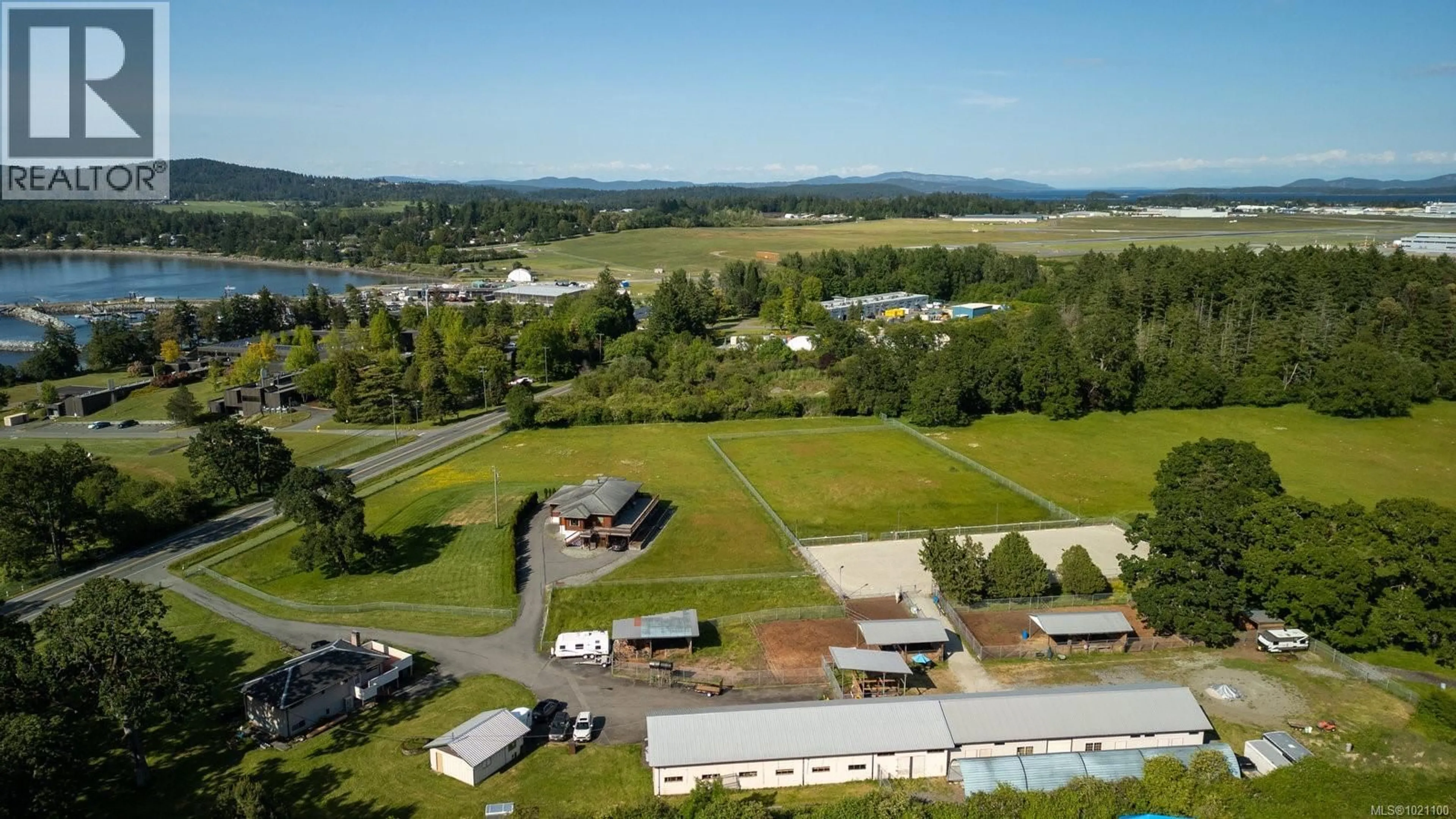 A pic from outside/outdoor area/front of a property/back of a property/a pic from drone, mountain view for 9775 WEST SAANICH ROAD, North Saanich British Columbia V8L5T5