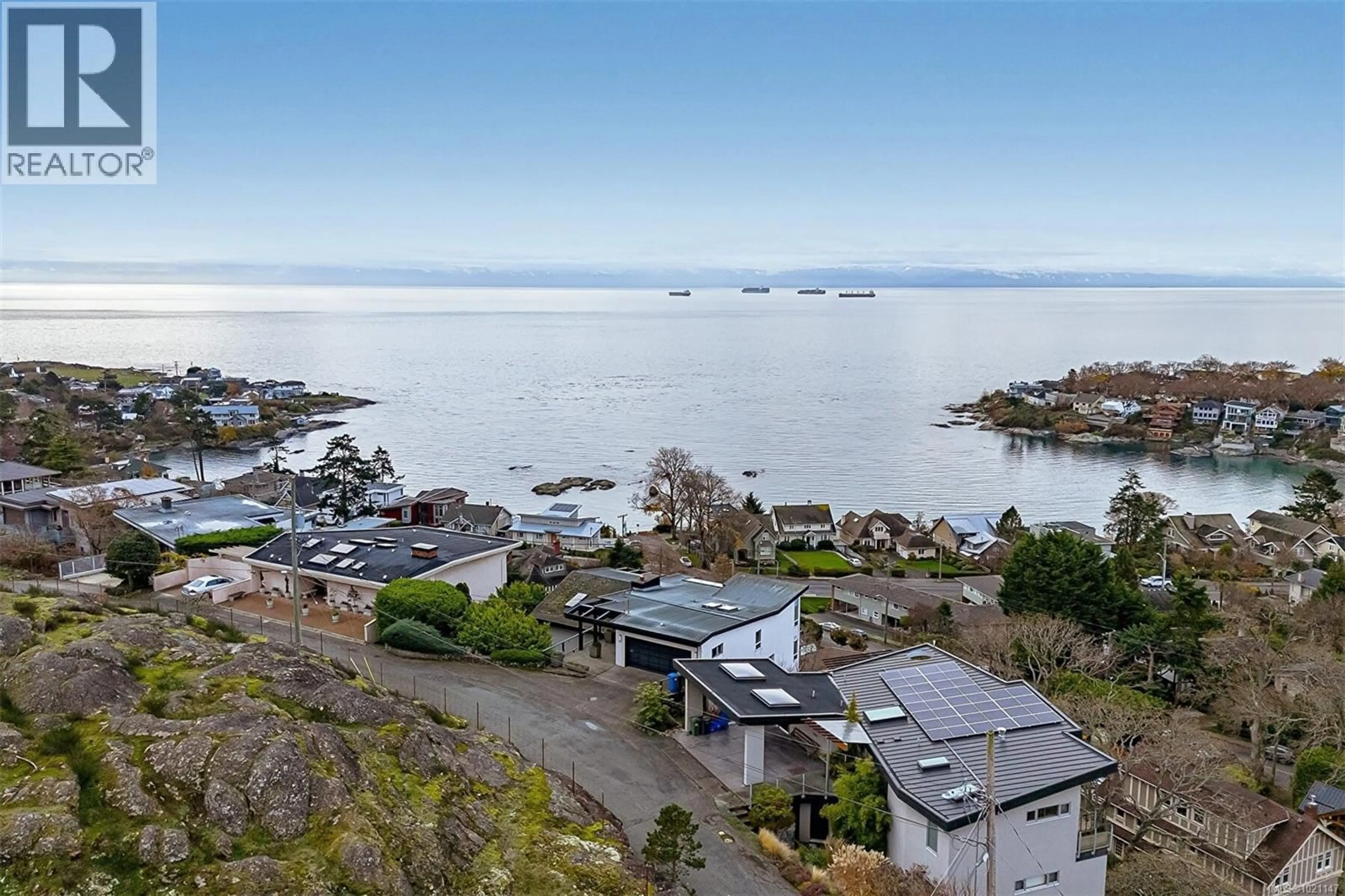 A pic from outside/outdoor area/front of a property/back of a property/a pic from drone, water/lake/river/ocean view for 117 BARKLEY TERRACE, Oak Bay British Columbia V8S1Y1