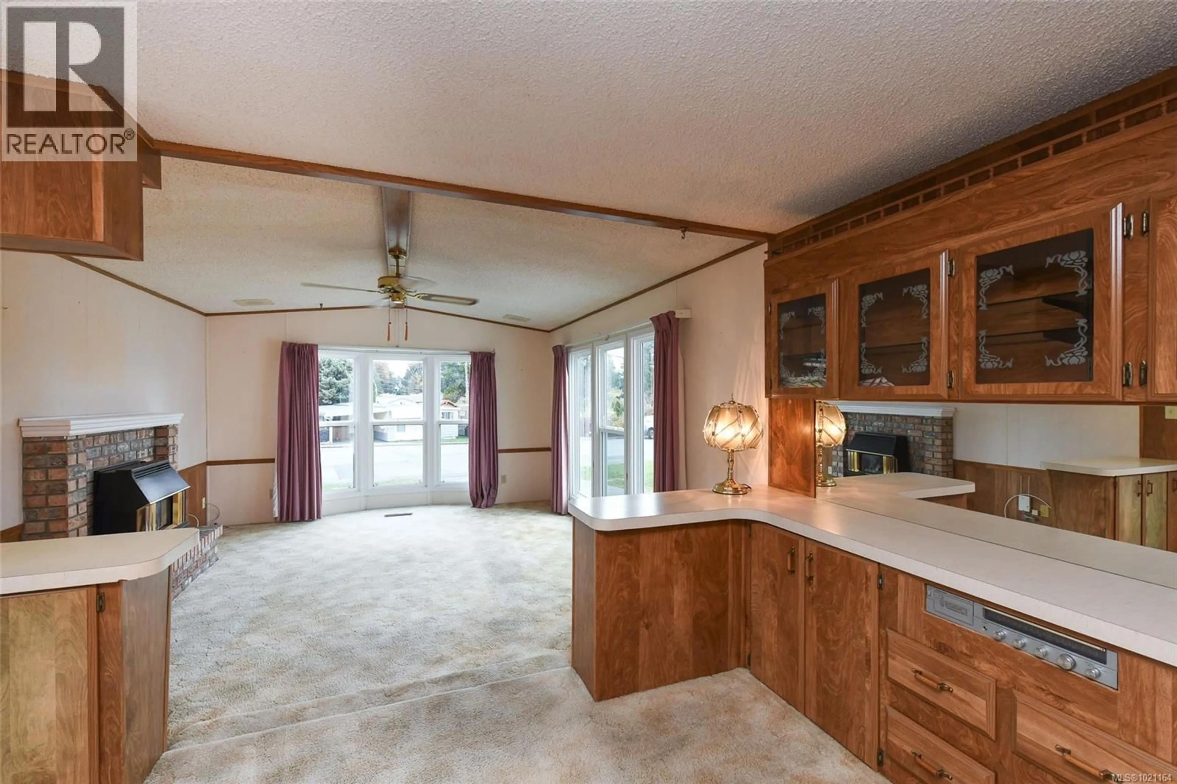 Open concept kitchen, unknown for 491 COWICHAN AVENUE, Courtenay British Columbia V9N7M1