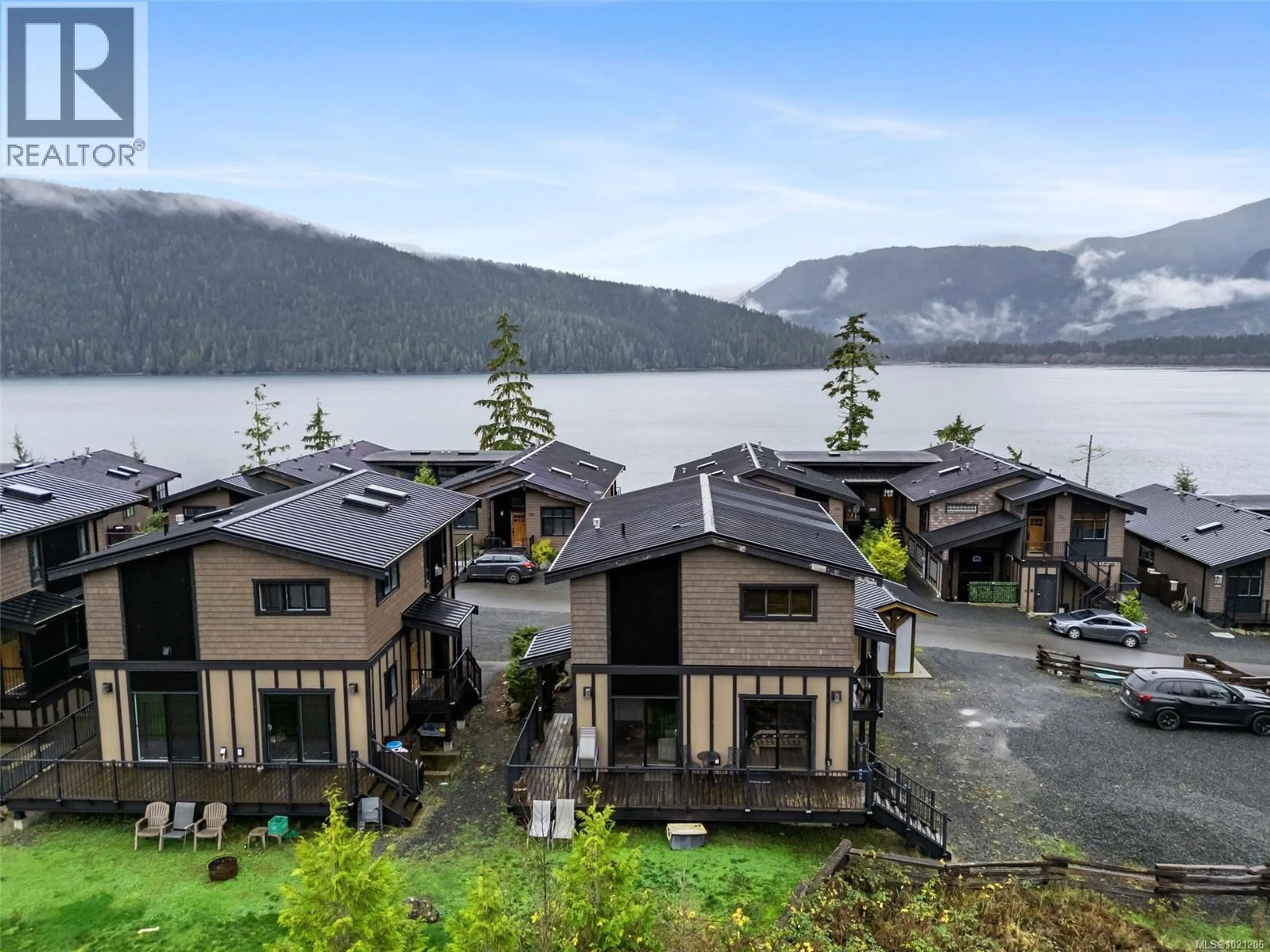 A pic from outside/outdoor area/front of a property/back of a property/a pic from drone, water/lake/river/ocean view for 221 - 6596 BAIRD ROAD, Port Renfrew British Columbia V0S1K0