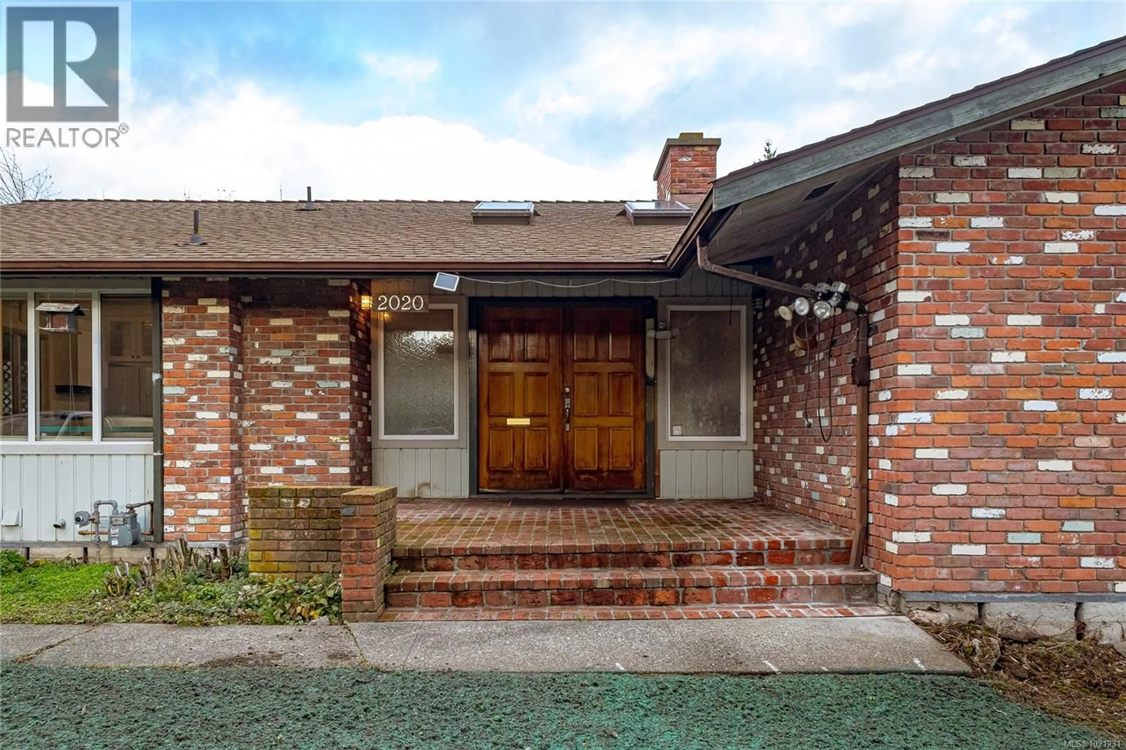 Home with brick exterior material, street for 2020 SALTAIR PLACE, Saanich British Columbia V8N4T2