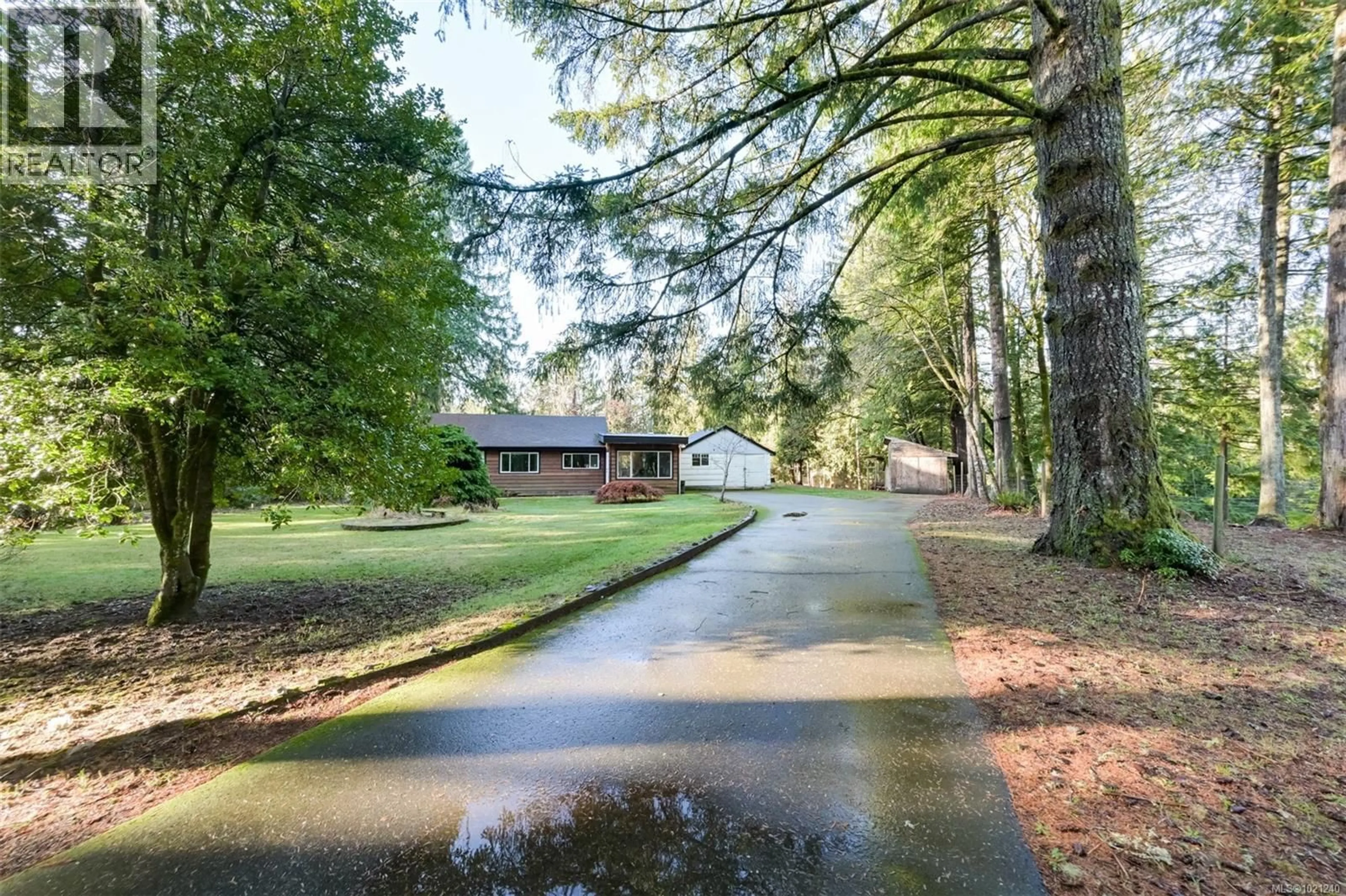 A pic from outside/outdoor area/front of a property/back of a property/a pic from drone, forest/trees view for 5742 MENZIES ROAD, Duncan British Columbia V9L6G7