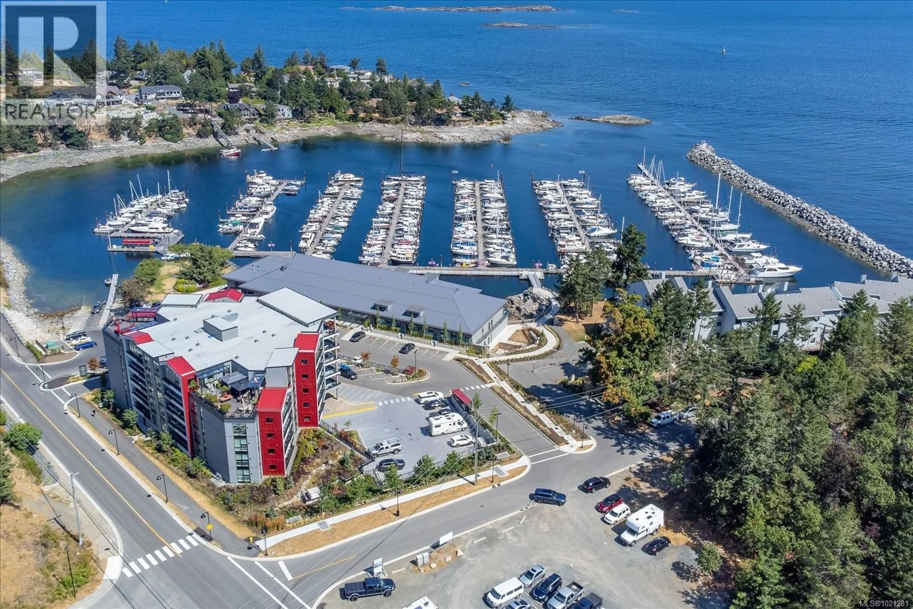 A pic from outside/outdoor area/front of a property/back of a property/a pic from drone, water/lake/river/ocean view for 305 - 3529 DOLPHIN DRIVE, Nanoose Bay British Columbia V9P9J7