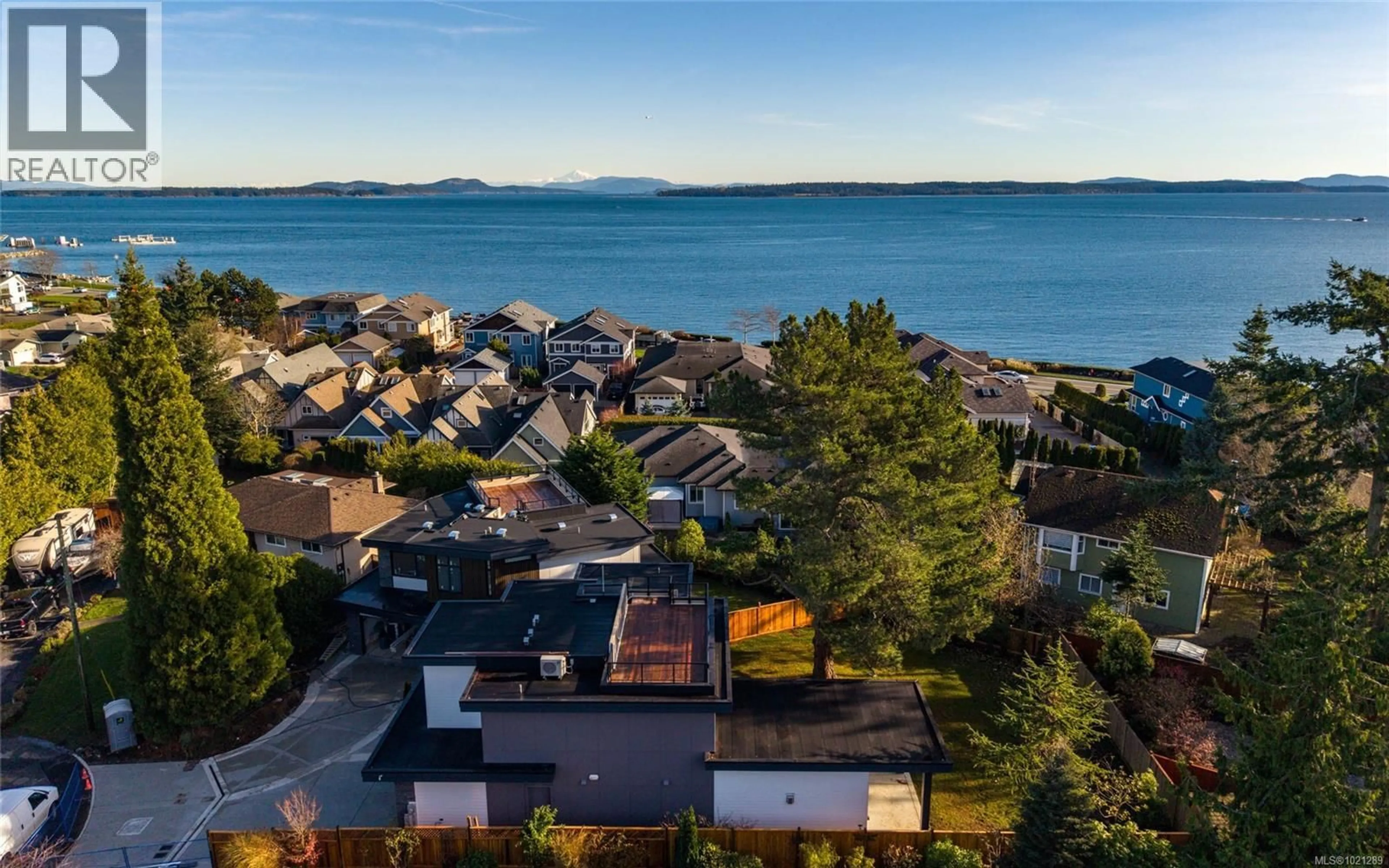 A pic from outside/outdoor area/front of a property/back of a property/a pic from drone, water/lake/river/ocean view for 2295 ADELA PLACE, Sidney British Columbia V8L1R2